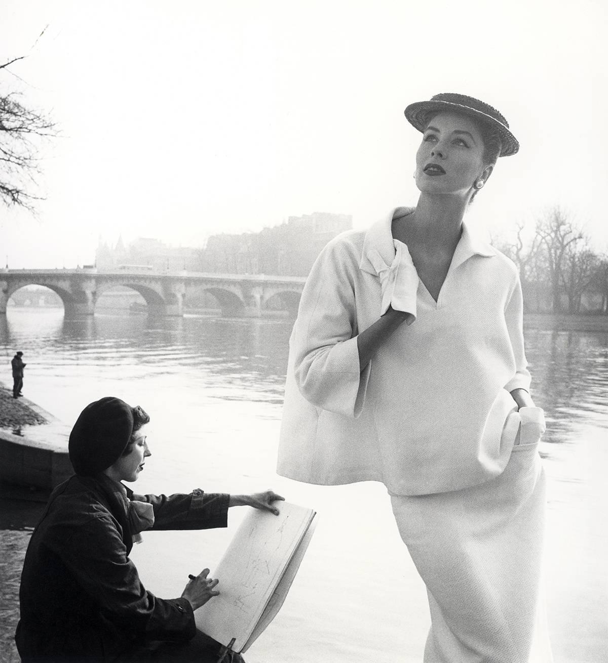 Louise Dahl-Wolfe Black and White Photograph - Suzy Parker in Balenciaga along the Seine, Paris