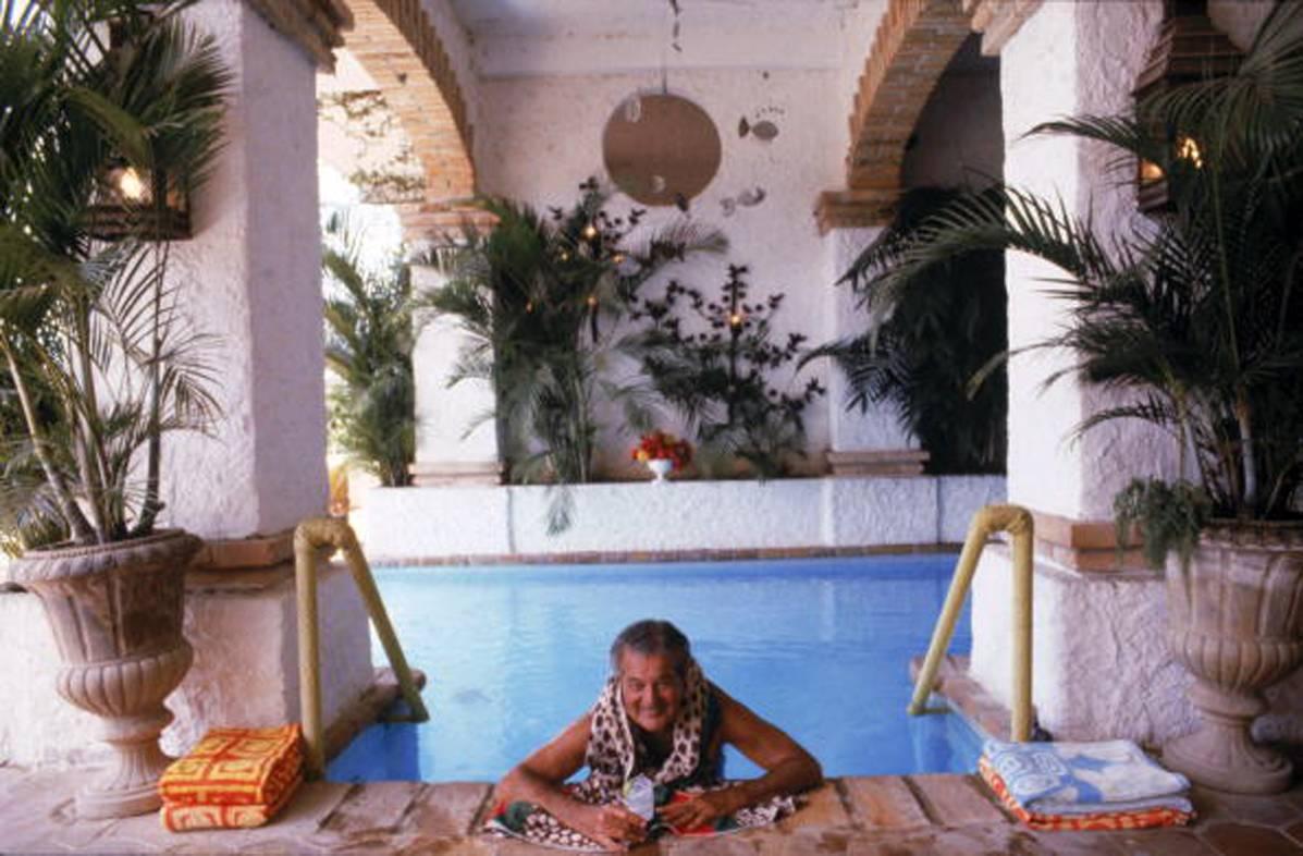 Slim Aarons Color Photograph - Paul Bancroft of San Francisco, Pool at Puerto Vallerta, Mexico, 1979 