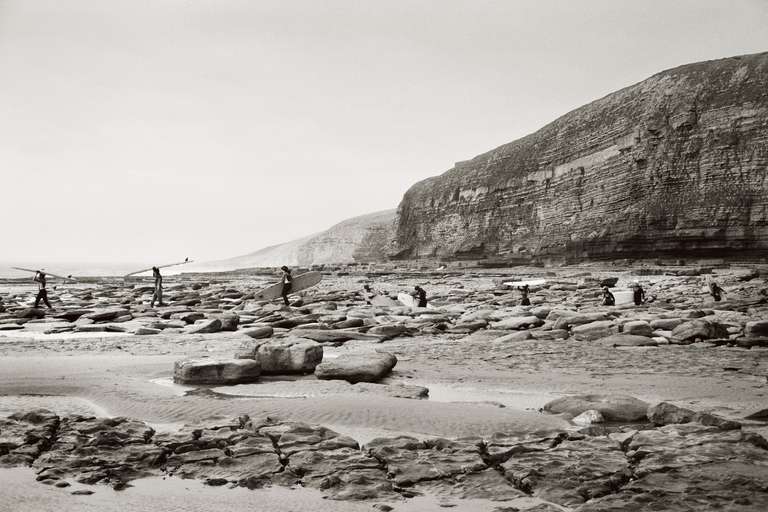 Priscilla Rattazzi Black and White Photograph - Surfers at Southerndown, Wales, UK