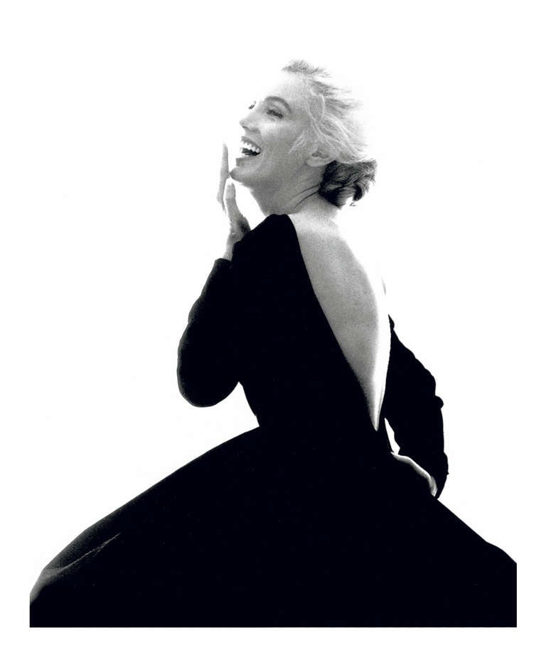 Bert Stern Portrait Photograph - Marilyn Monroe: From “The Last Sitting Ⓡ” (Black Dress, laughing)