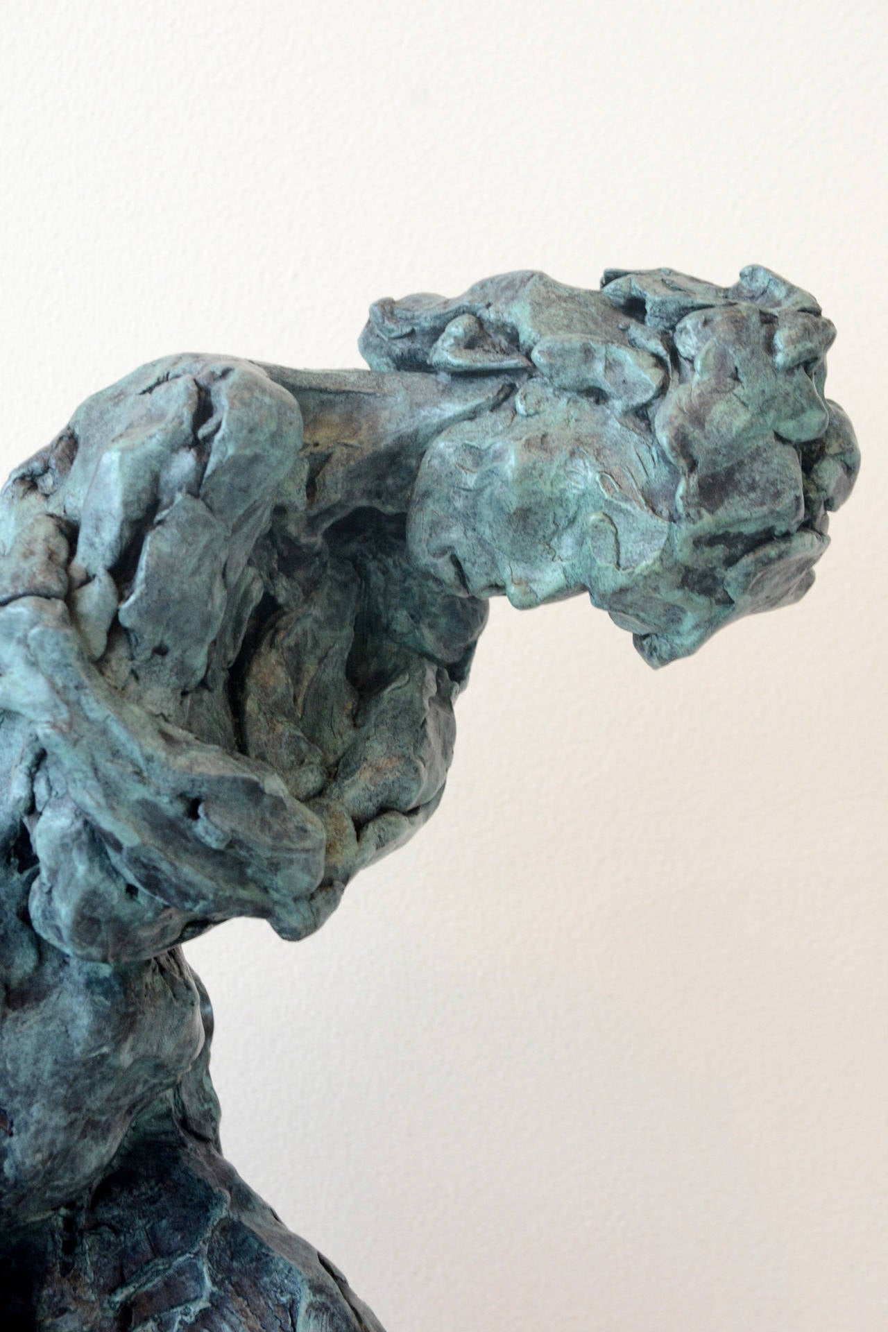 In this thoughtful sculpture by Canadian artist Richard Tosczak, the gestures of a female figure, head bent, arms wrapped, is captured in bronze. Known for his beautiful figurative work, this piece retains the artist’s signature highly textured