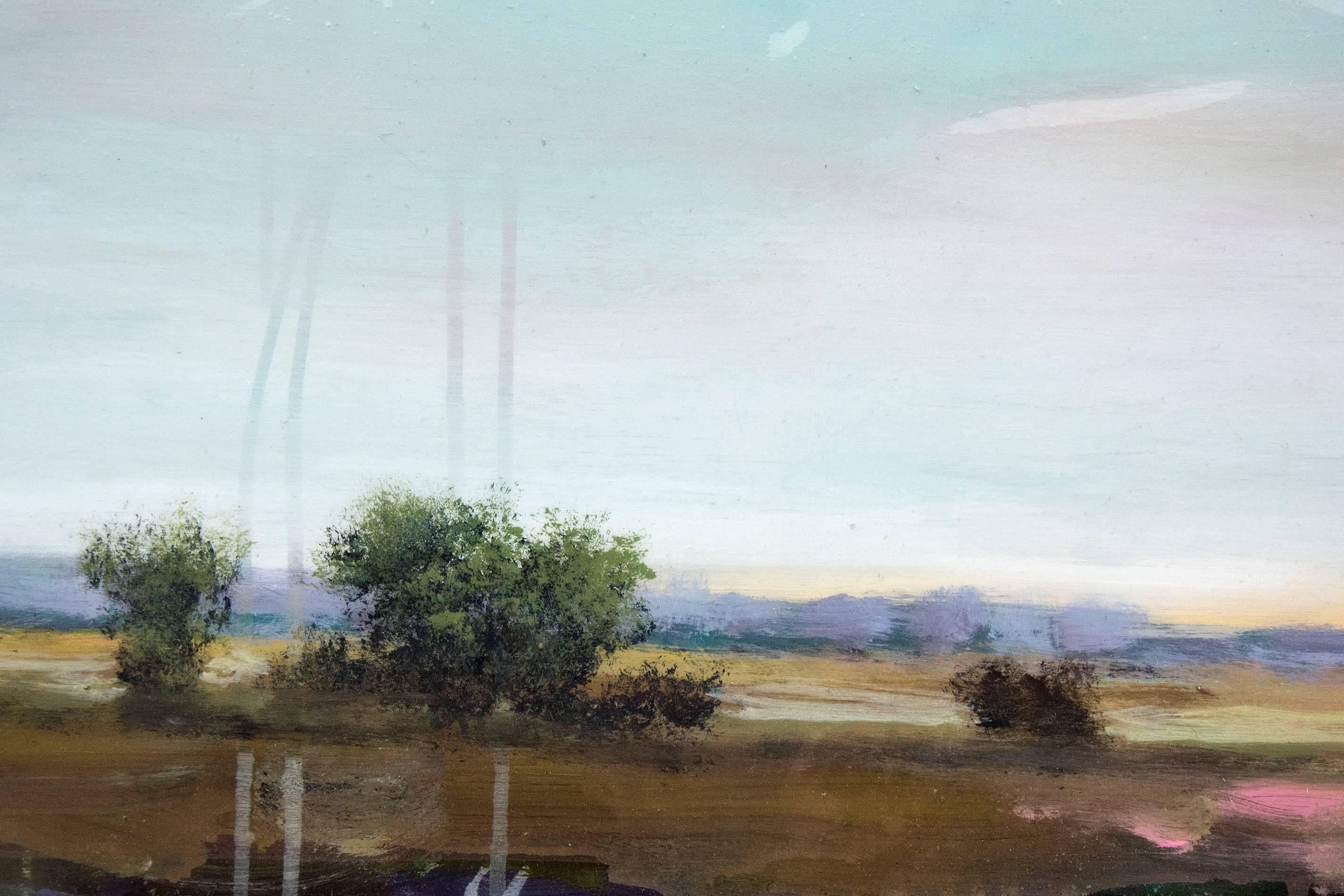 This is a new painting just arrived from the Berlin studio of acclaimed Canadian painter Peter Hoffer. A panoramic view of a sparse treed landscape displayed on a colorful sky backdrop boasting hues of lavender and blues. The painting has a