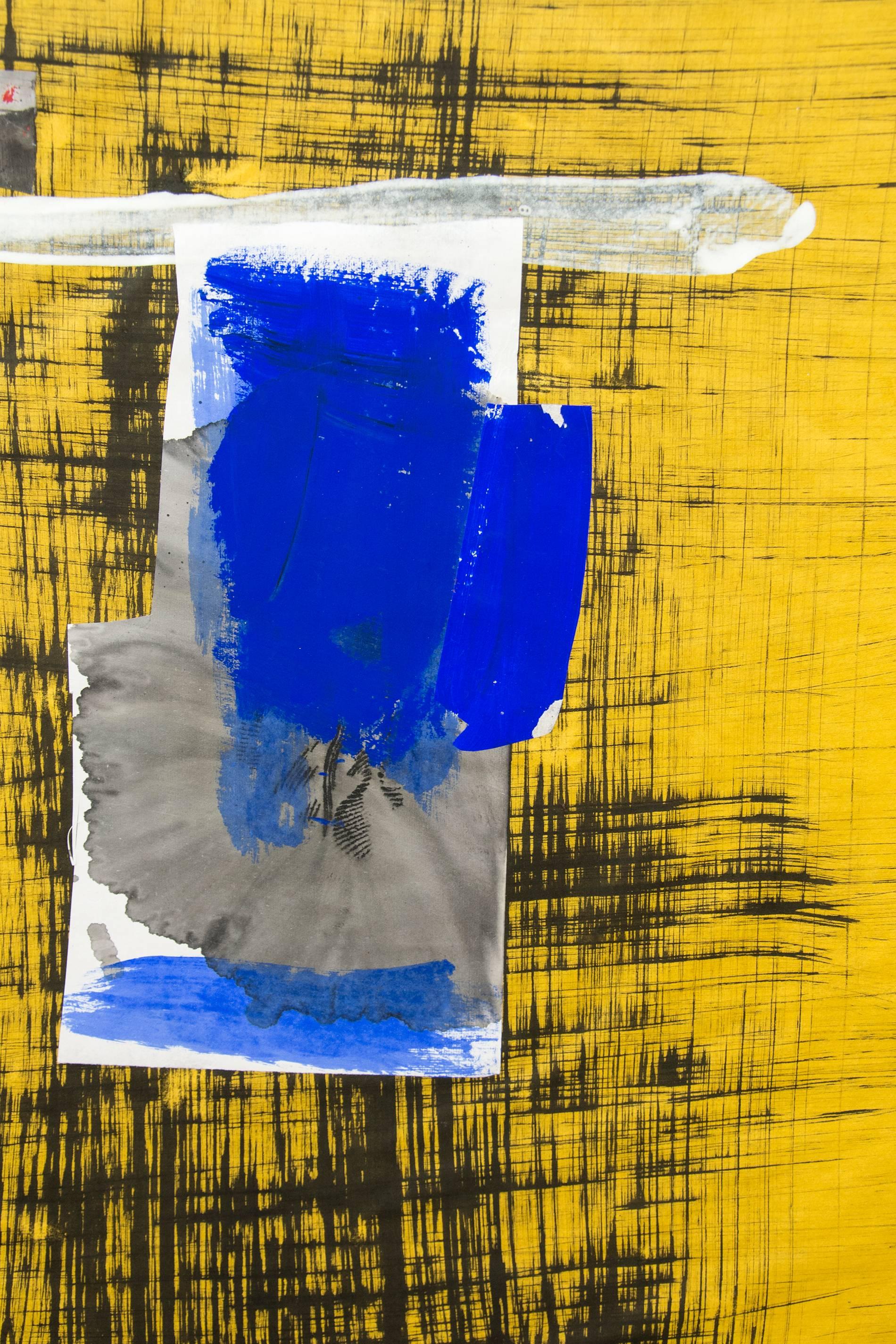 Vertical composition on paper with a canary yellow acrylic ground over which bristle brushed lines are cross hatched in black. Layered over these central marks is a central collaged strip of paper highlighted in ultra marine blue and grey topped by