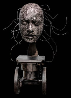 Press - tall, steam-punk inspired, human face, lead, aluminum and iron sculpture