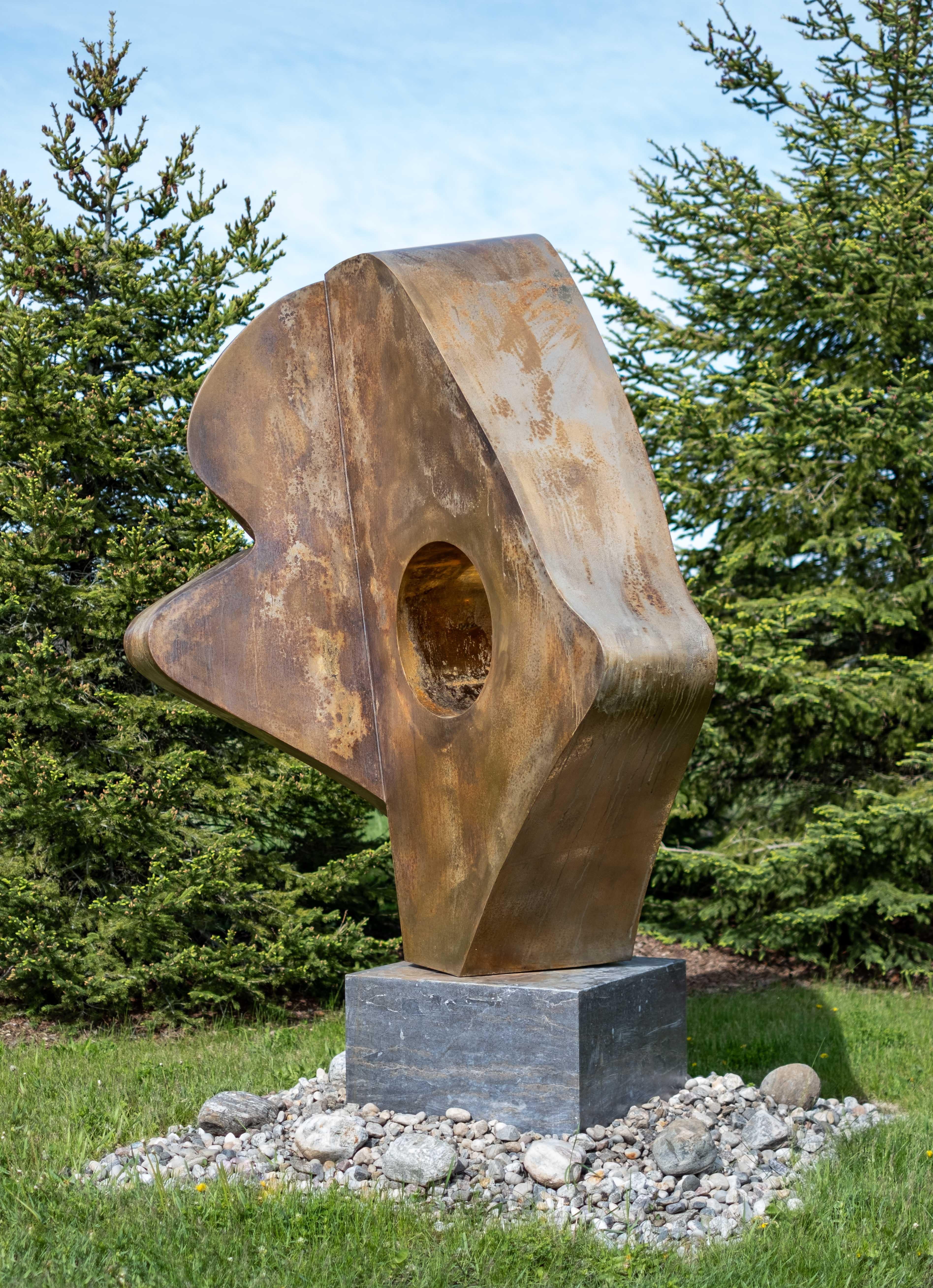 ‘Andromeda,’ Viktor Mitic’s grand contemporary outdoor sculpture forged from stainless steel is has a patina finish and is accented in 24 kt. gold. The abstract fluid lines of this powerful piece are accentuated by the light-reflecting quality of