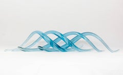 East Wind - blue, translucent, flowing, glass, intersecting tabletop sculpture