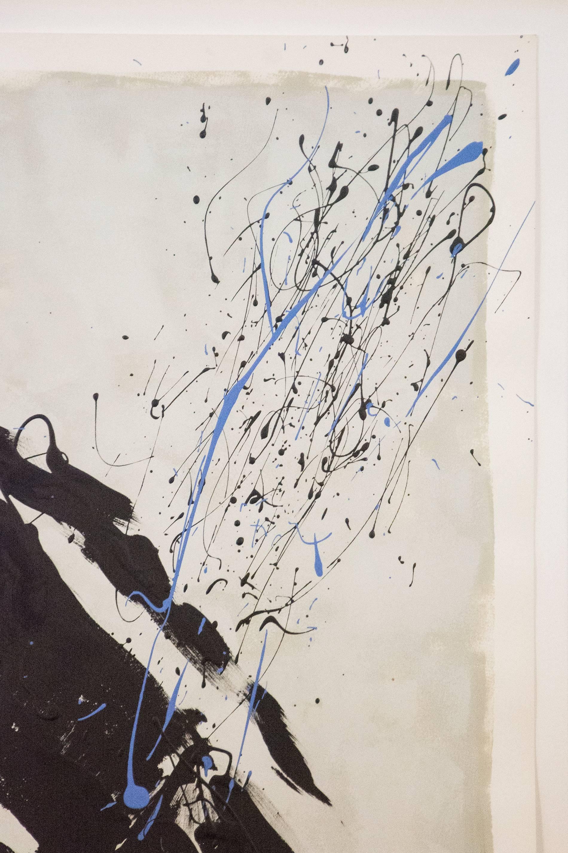 Rising above a strip of inky black, a black rag doll figure rendered in calligraphic brushstrokes meets three curved lines resembling waves in this painting on paper. A spray of light blue latex and black ink across the composition completes this