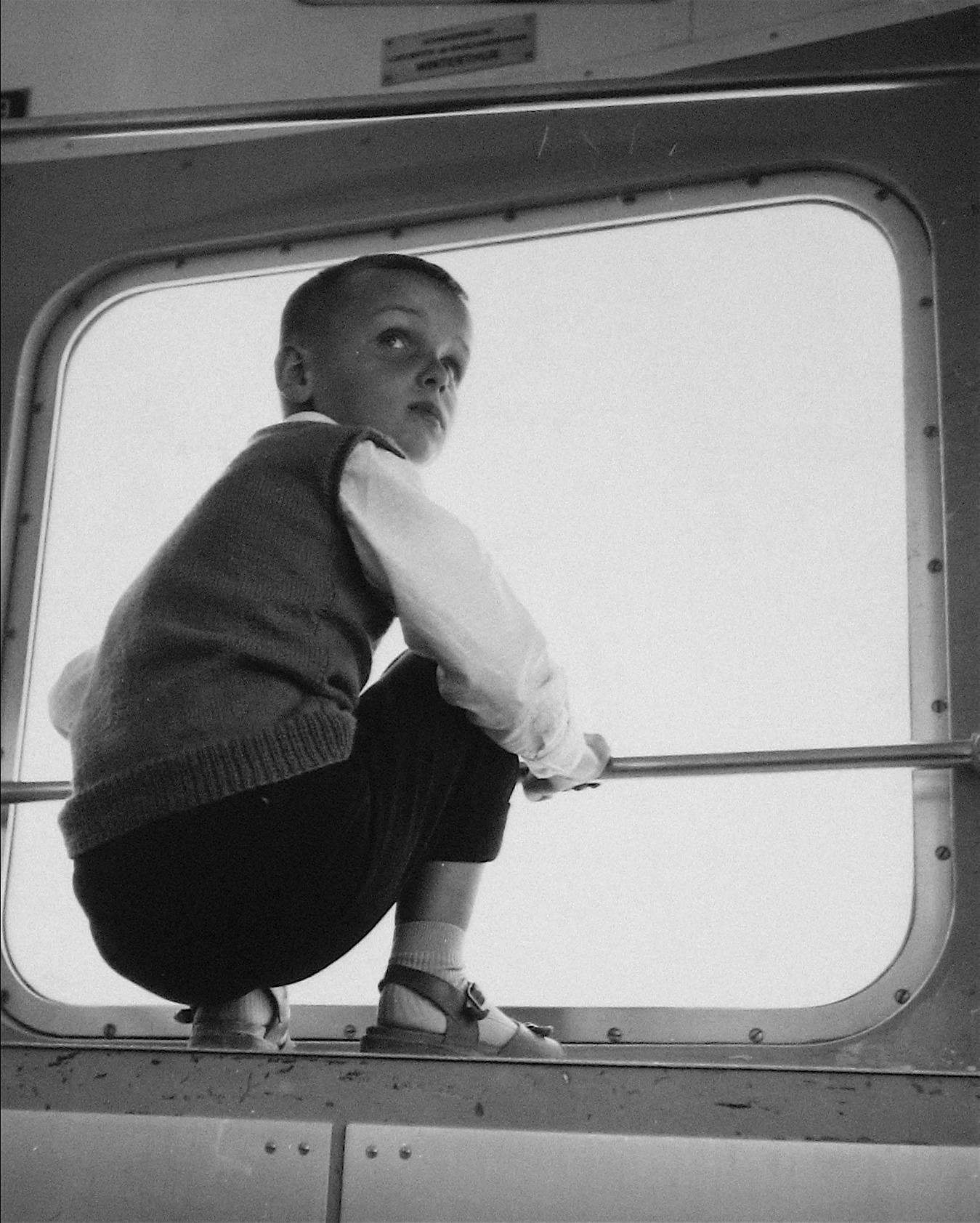 Roz Joseph Black and White Photograph - Boy on a Swiss Train, Photograph, 1960s