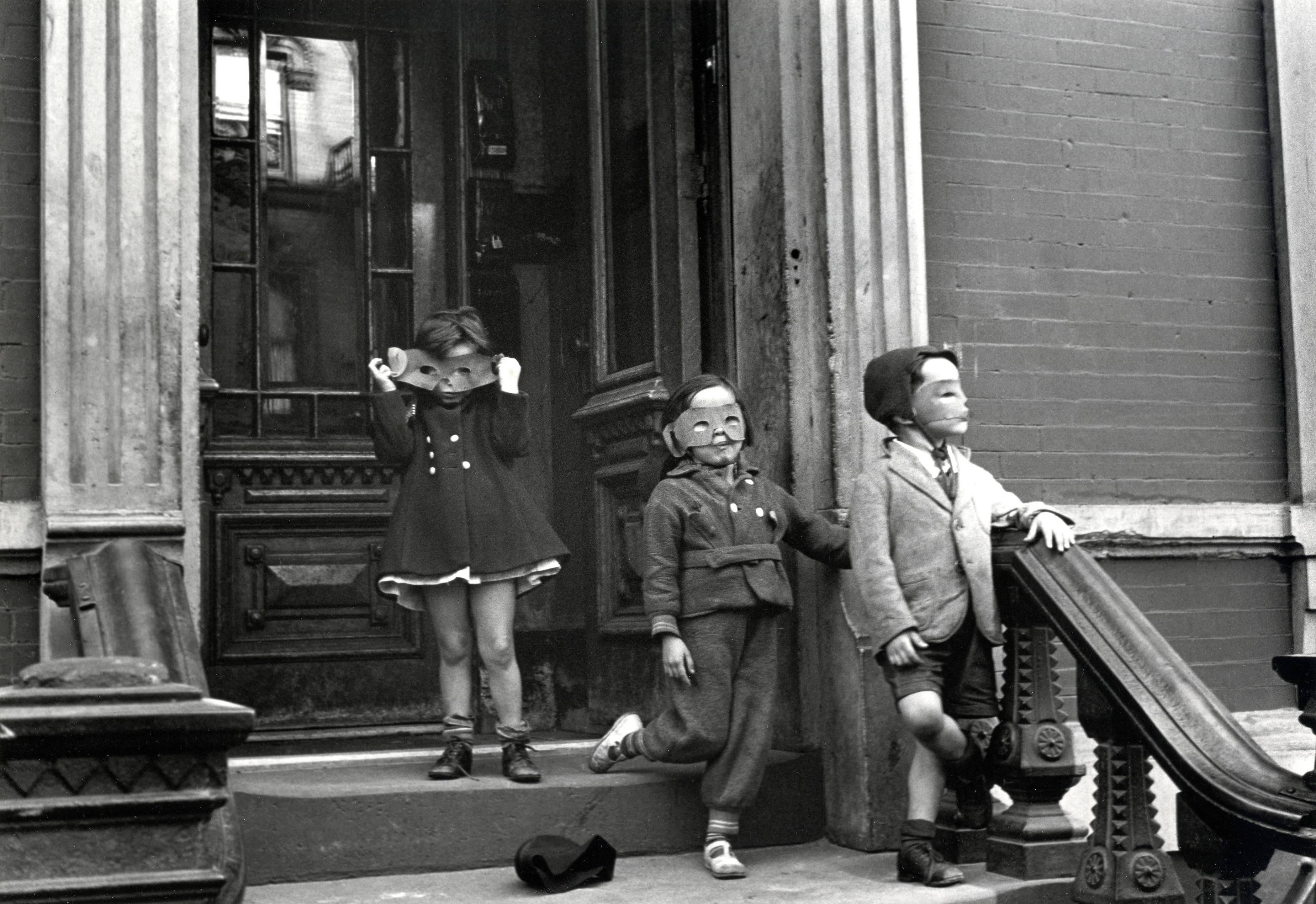 Helen Levitt Black and White Photograph - New York City (3 kids with masks)