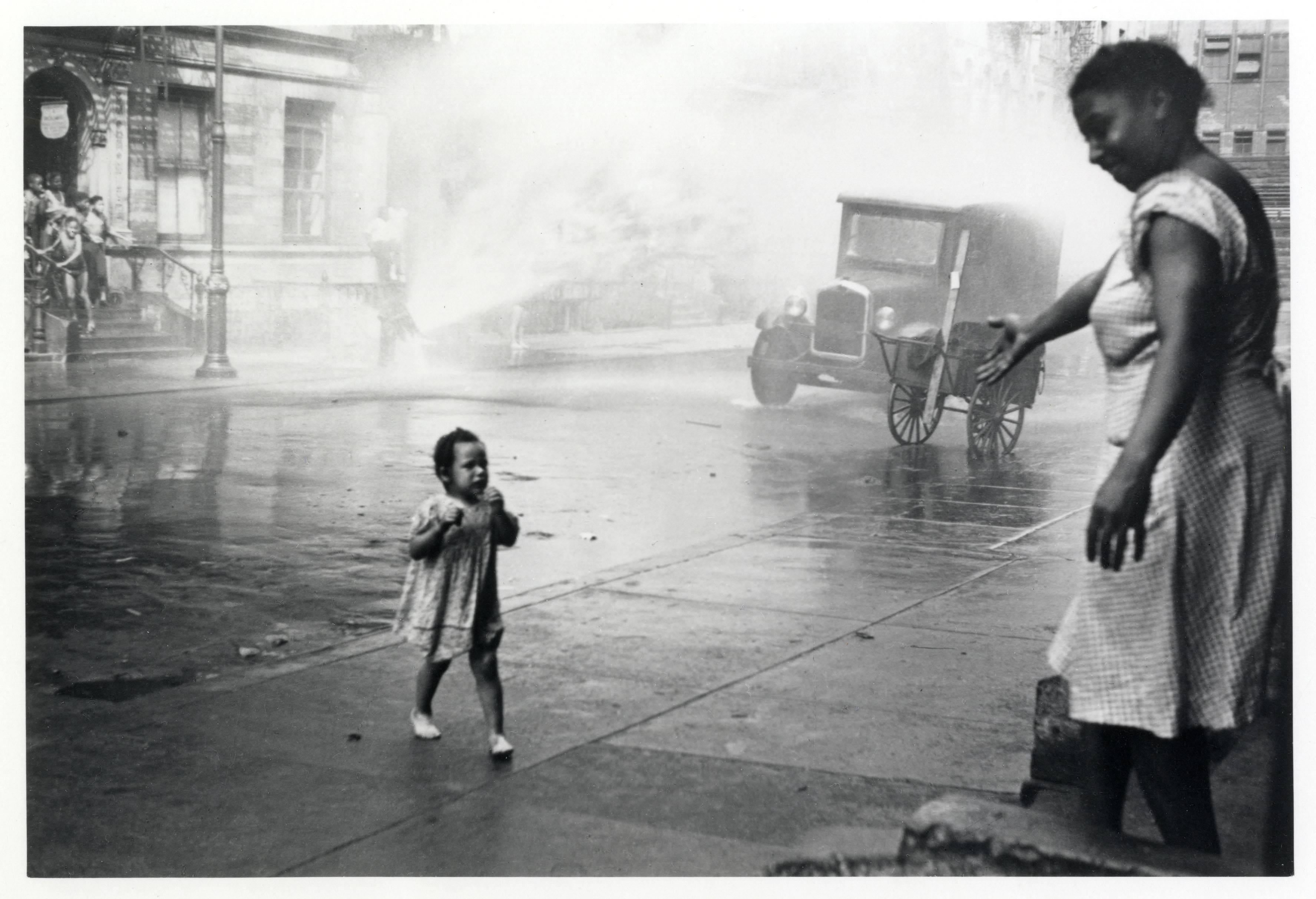 Helen Levitt Black and White Photograph - New York City (woman reaching out)