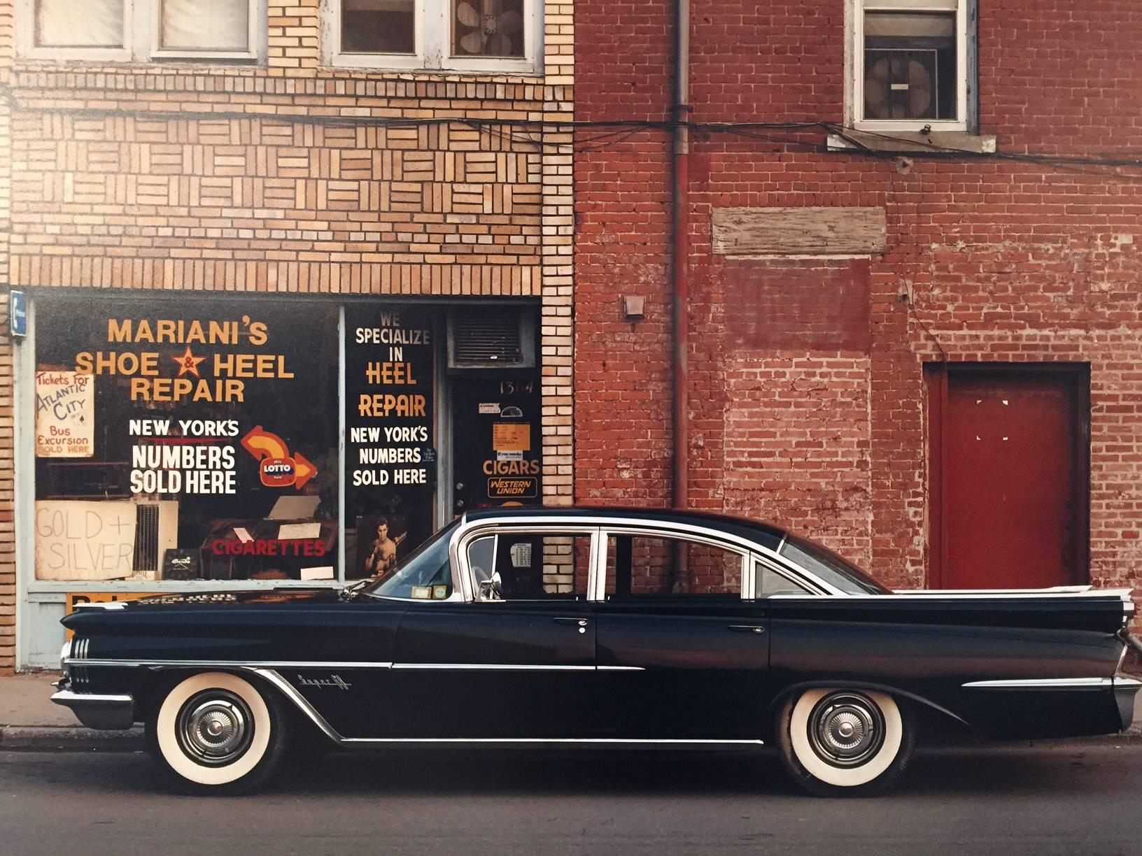 Bruce Wrighton Color Photograph - 1959 Oldsmobile Super 88, Mariani's Shoe & Heel Repair, Endicott, NY