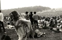 Vintage Woodstock (woman carrying child)