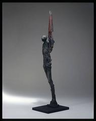Standing Man with Red Blade