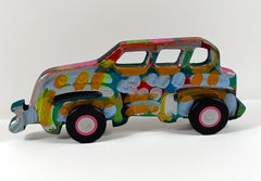 Escultura vintage de un coche de tres ventanas, tallada a mano y pintada en madera, de Frank Romero