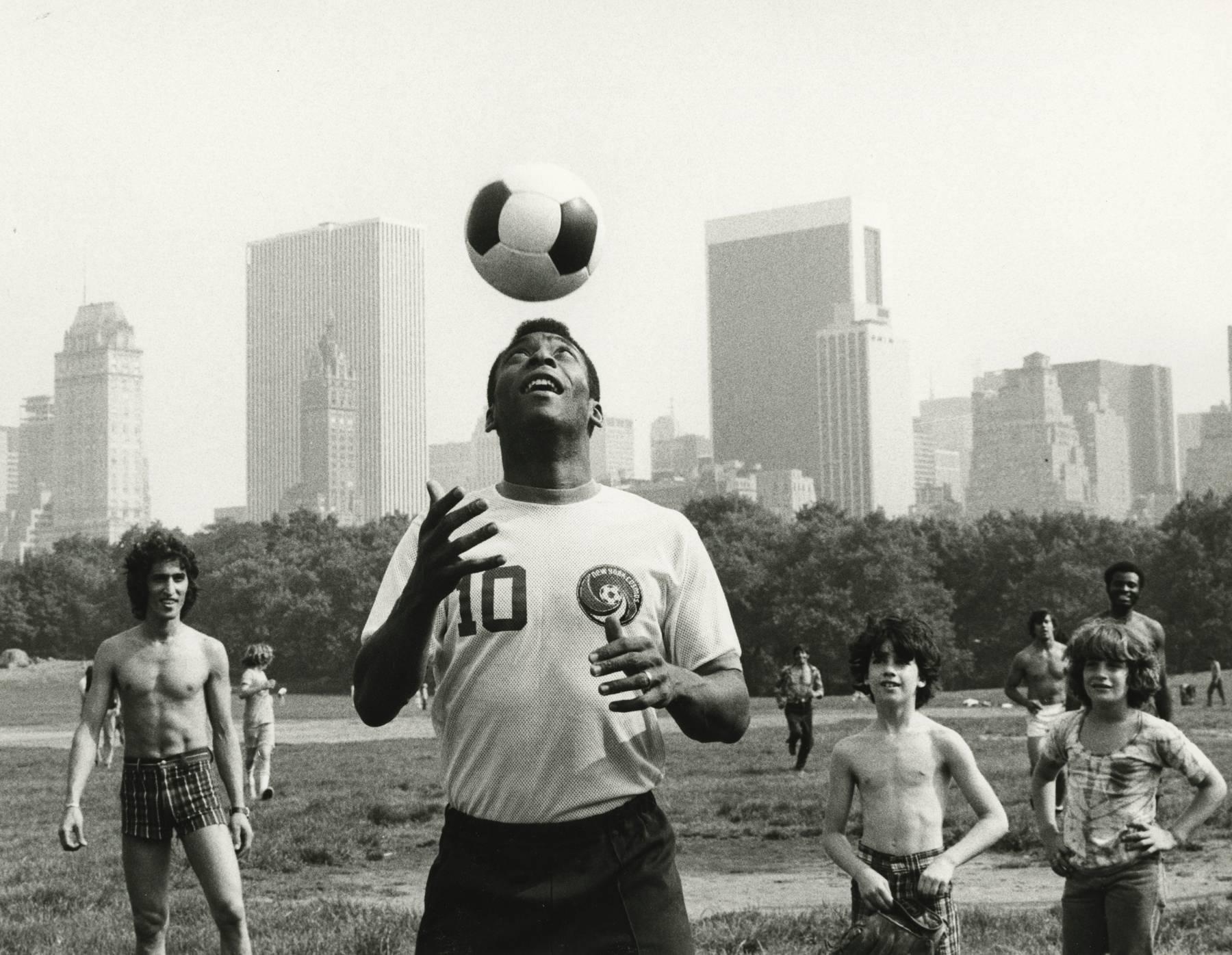 Marvin Newman Black and White Photograph - Pele in NYC's Central Park