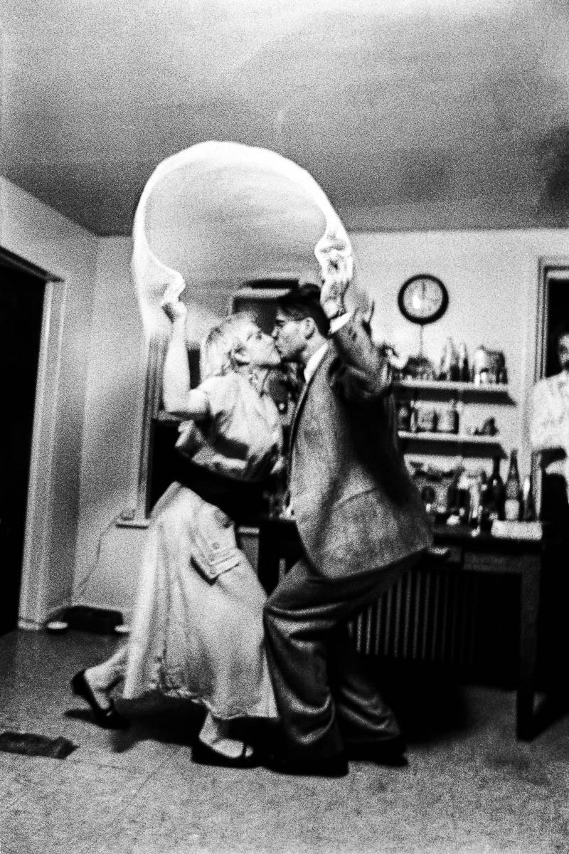 Ken Schles Black and White Photograph - The Wedding Kiss