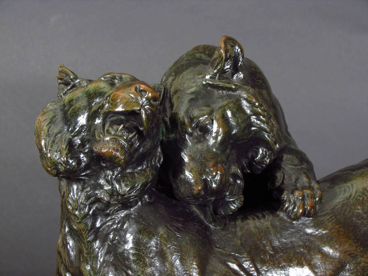 Tiger and Tigress by Charles Valton

Antique french bronze group depicting two tigers.

Circa: 1882    Signed: C. Valton    Foundry Stamp: Colin et Cie. Paris

Charles Valton 1851-1918

Valton was a student of Barye and Fremiet and exhibited at the