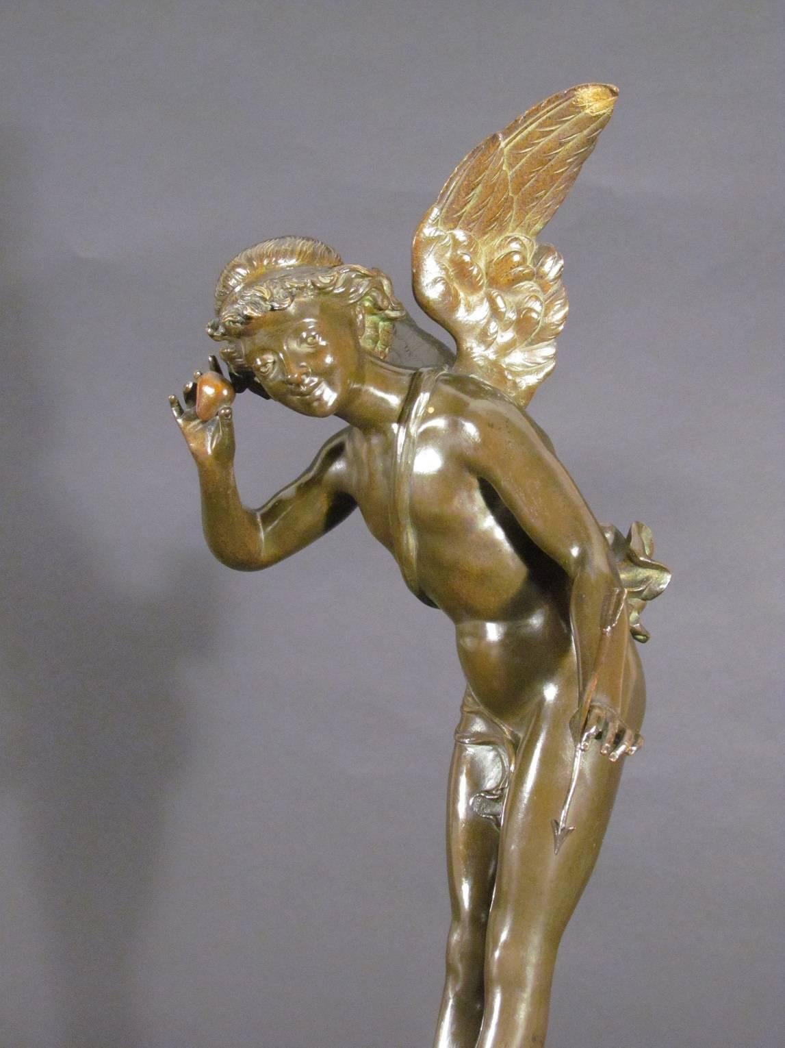 Antique french bronze sculpture of Cupid with heart.

Il Bat   Circa 1885    Height: 20 