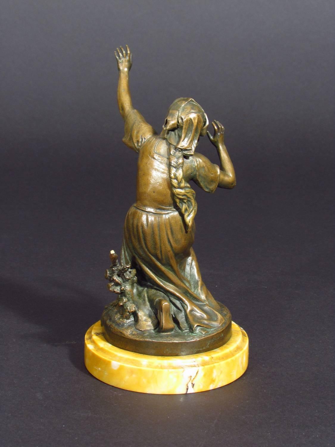 Antique bronze sculpture depicting the kneeling figure of Joan of Arc.
Bronze on yellow marble base.

Allar sculpted mythological, allegorical and historical subjects. He won the Prix de Rome in 1869 & exhibited at the Salon de Paris & later at the