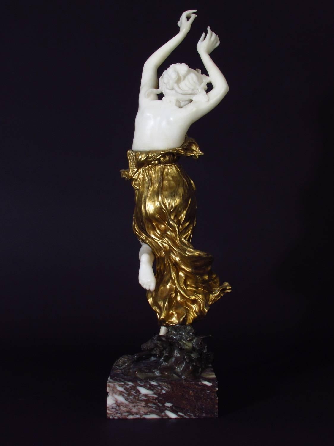 Dancer by Affortunato Gory 

Gilt bronze and white marble figure of a young dancer on a marble base.

Signed: Gory     Foundry pastille: LNJL

Affortunato Gory was an italian sculptor and studied at the Accademia di Belle Arti in Florence. As a
