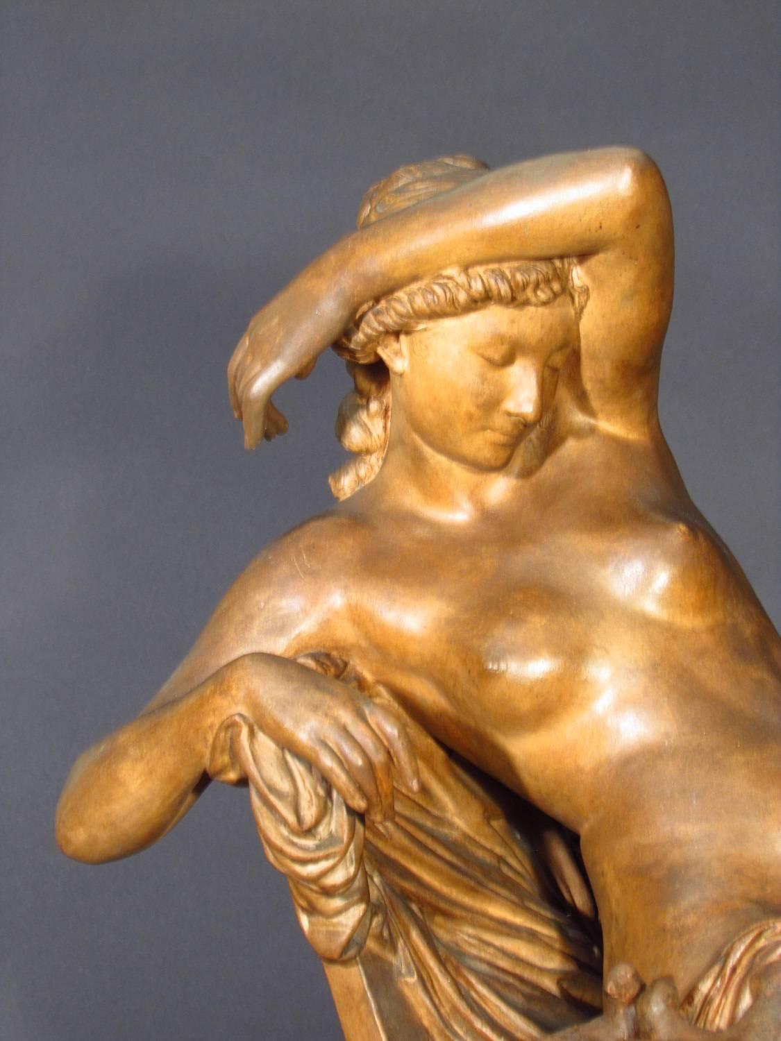 Awakening by Jules Franceschi (1825-1912)

Terracotta figure of a reclining woman in chair with doves.