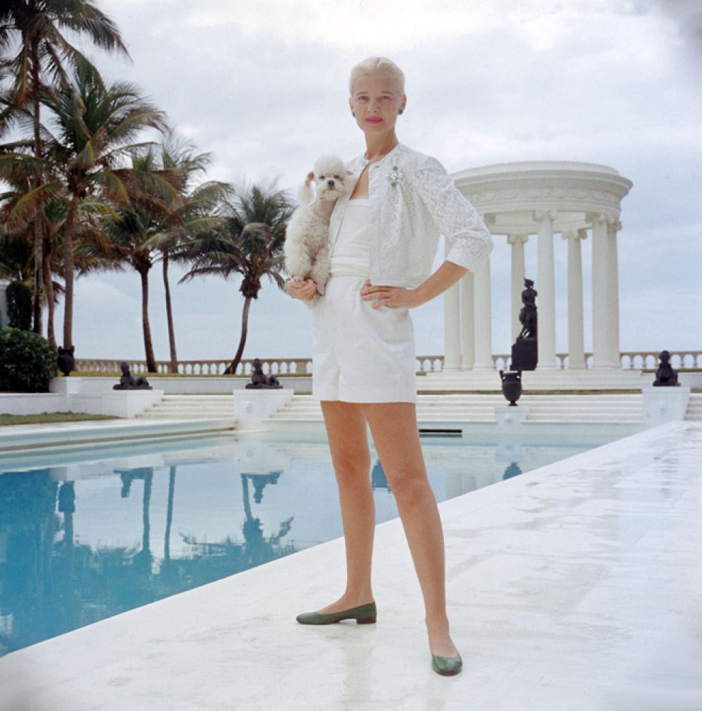 Slim Aarons Color Photograph - C.Z. Guest with her Poodle (Aarons Estate Edition)