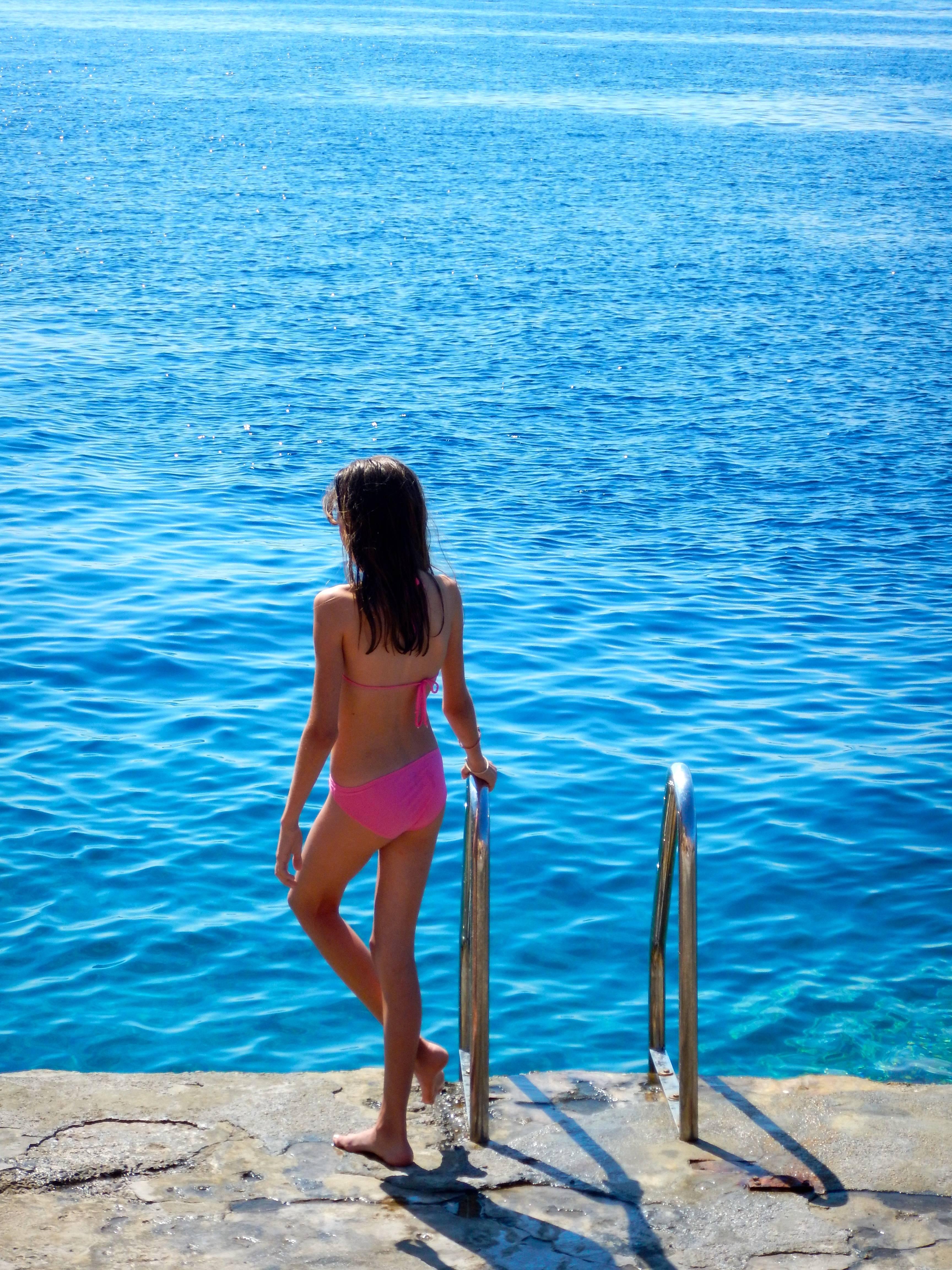 Leandros Pigades Color Photograph - Young Swimmer in Hydra