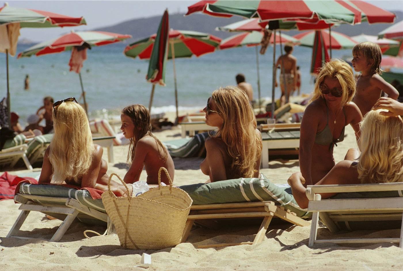 Saint Tropez Beach, 1971
Chromogenic Lambda print
Estate stamped and hand numbered edition of 150 with certificate of authenticity from the estate.

The beach at Saint-Tropez, on the French Riviera, August 1971. 

Slim Aarons (1916-2006) worked