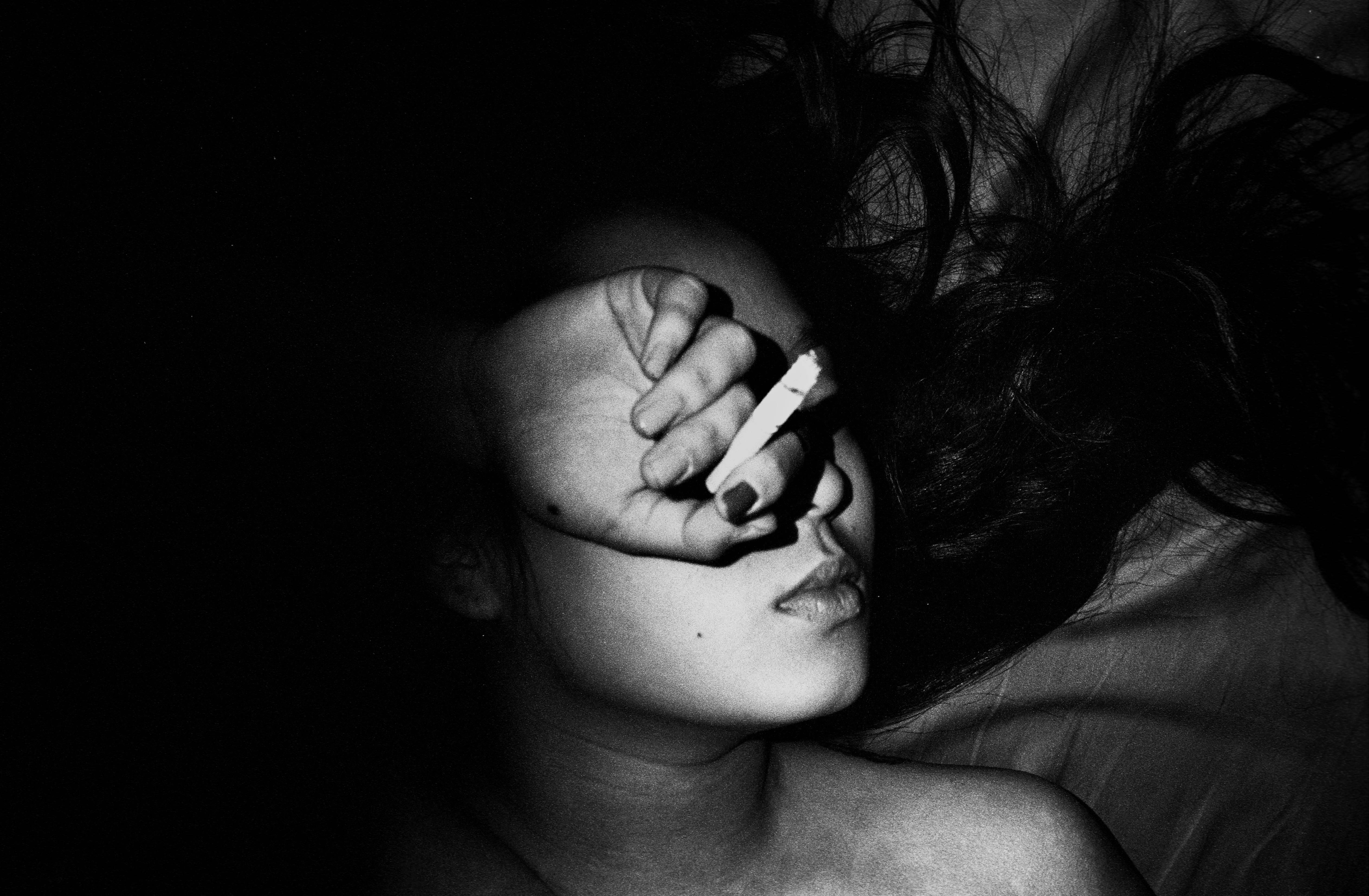Michael Grieve Black and White Photograph - The Foreigner [Sic}, Cigarette, Paris