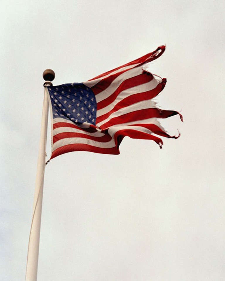 Michael Dweck Color Photograph - Flag at Snug Harbor, Montauk, New York