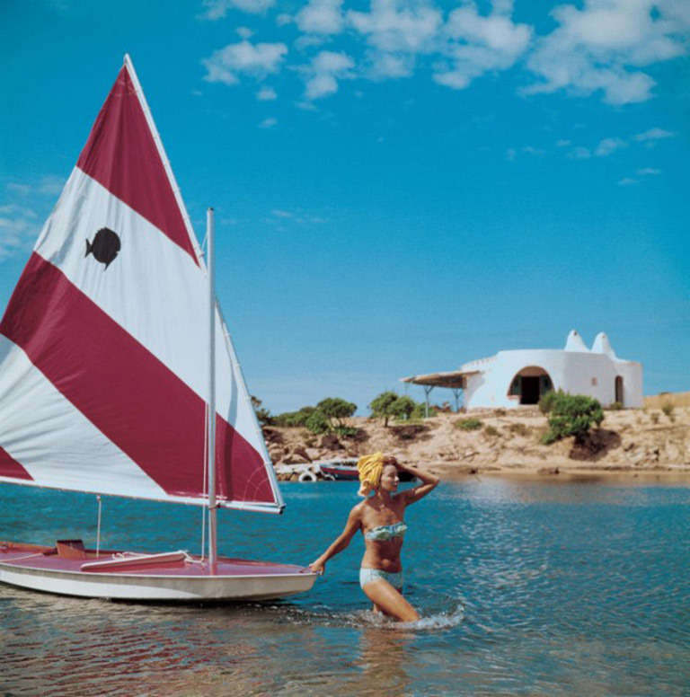 Slim Aarons Figurative Photograph - Sailing in Sardina