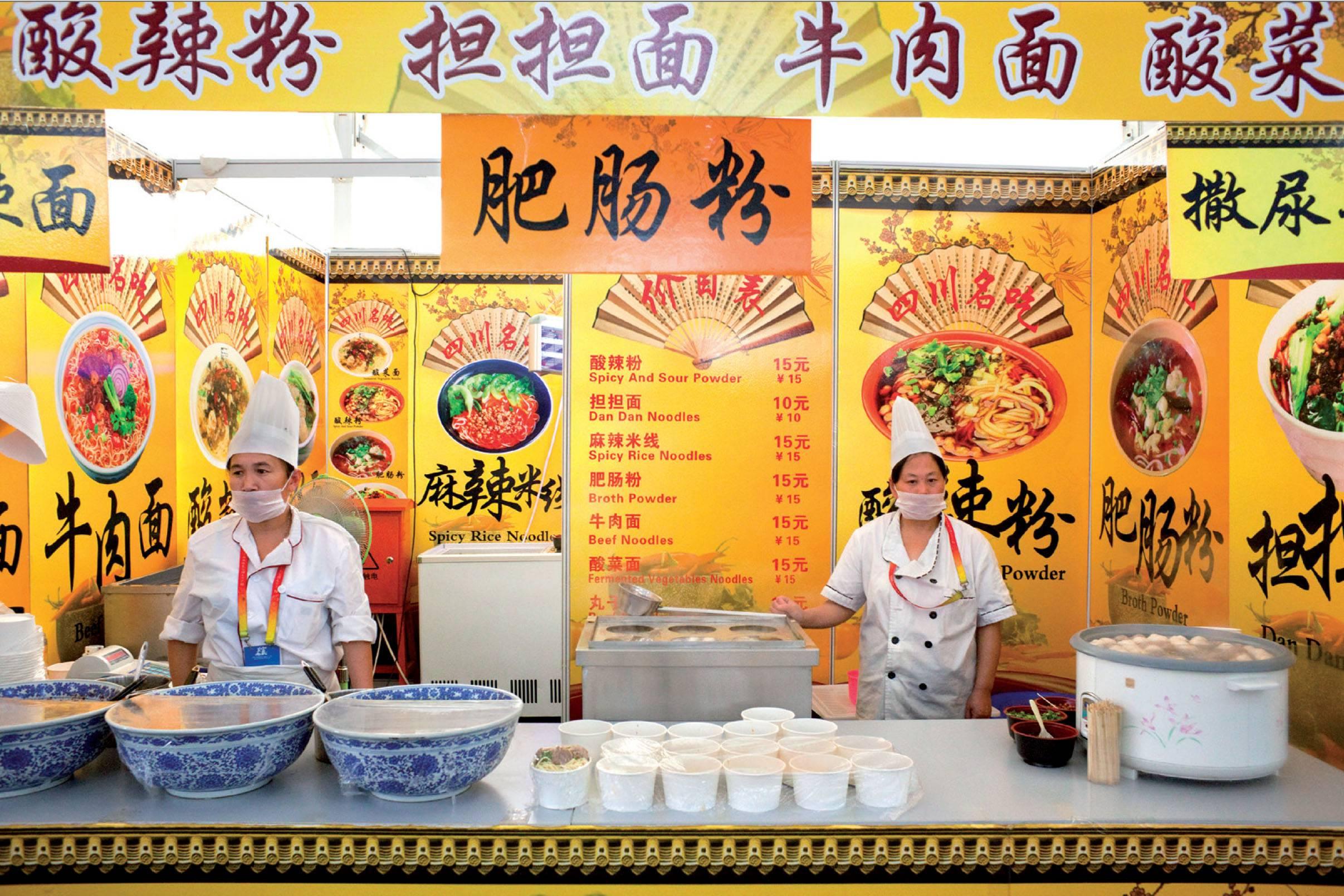 Anja Hitzenberger Color Photograph - Chinese Fast Food 12 (aka Yellow with Masks)