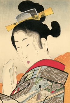 Beauty Holding a Hand Mirror