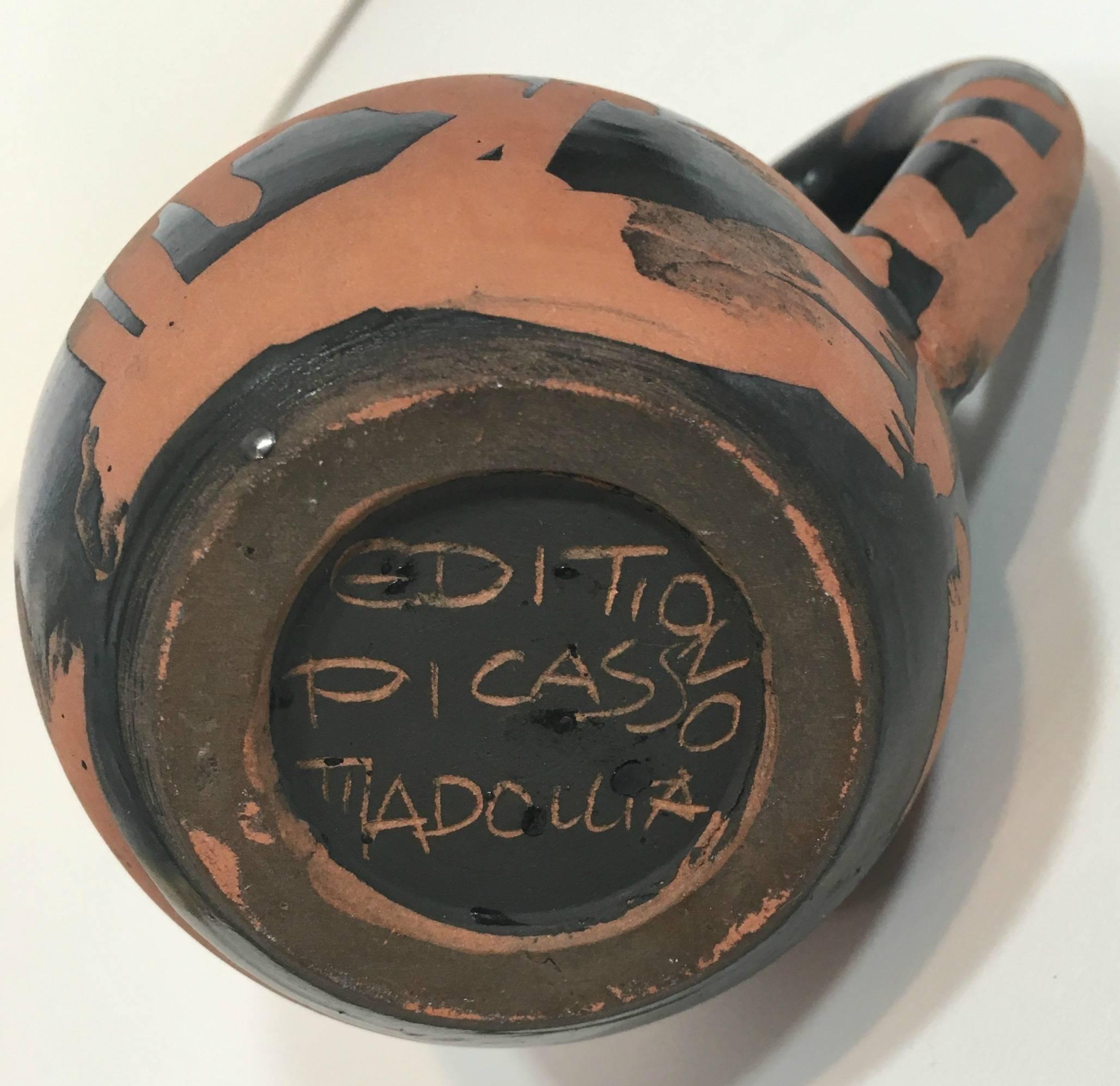 Painted and partially glazed ceramic pitcher, inscribed Edition Picasso Madoura on the base