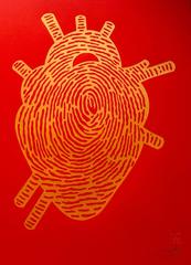 Coeur en forme de pouce rouge