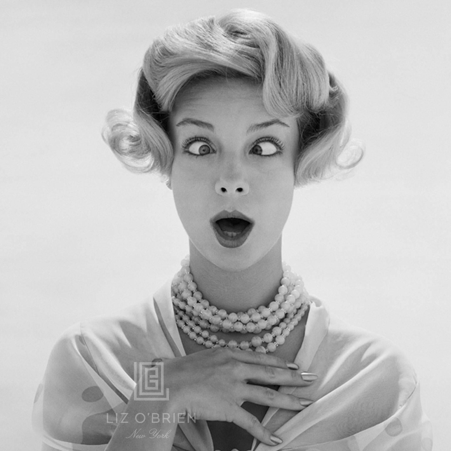 Mark Shaw Black and White Photograph - Mademoiselle Model Having Fun, 1958