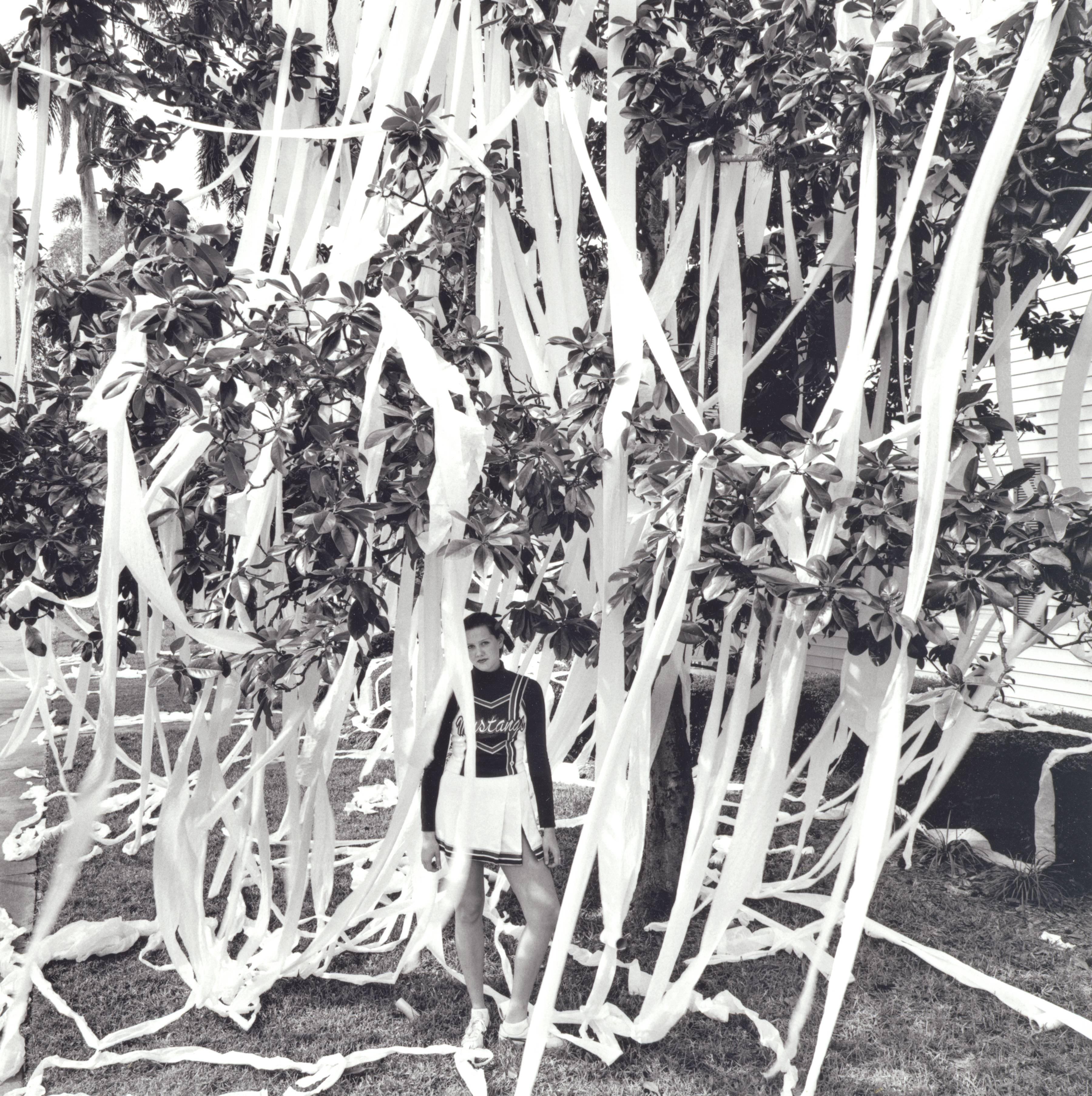 Burk Uzzle Black and White Photograph - Mustang Girl