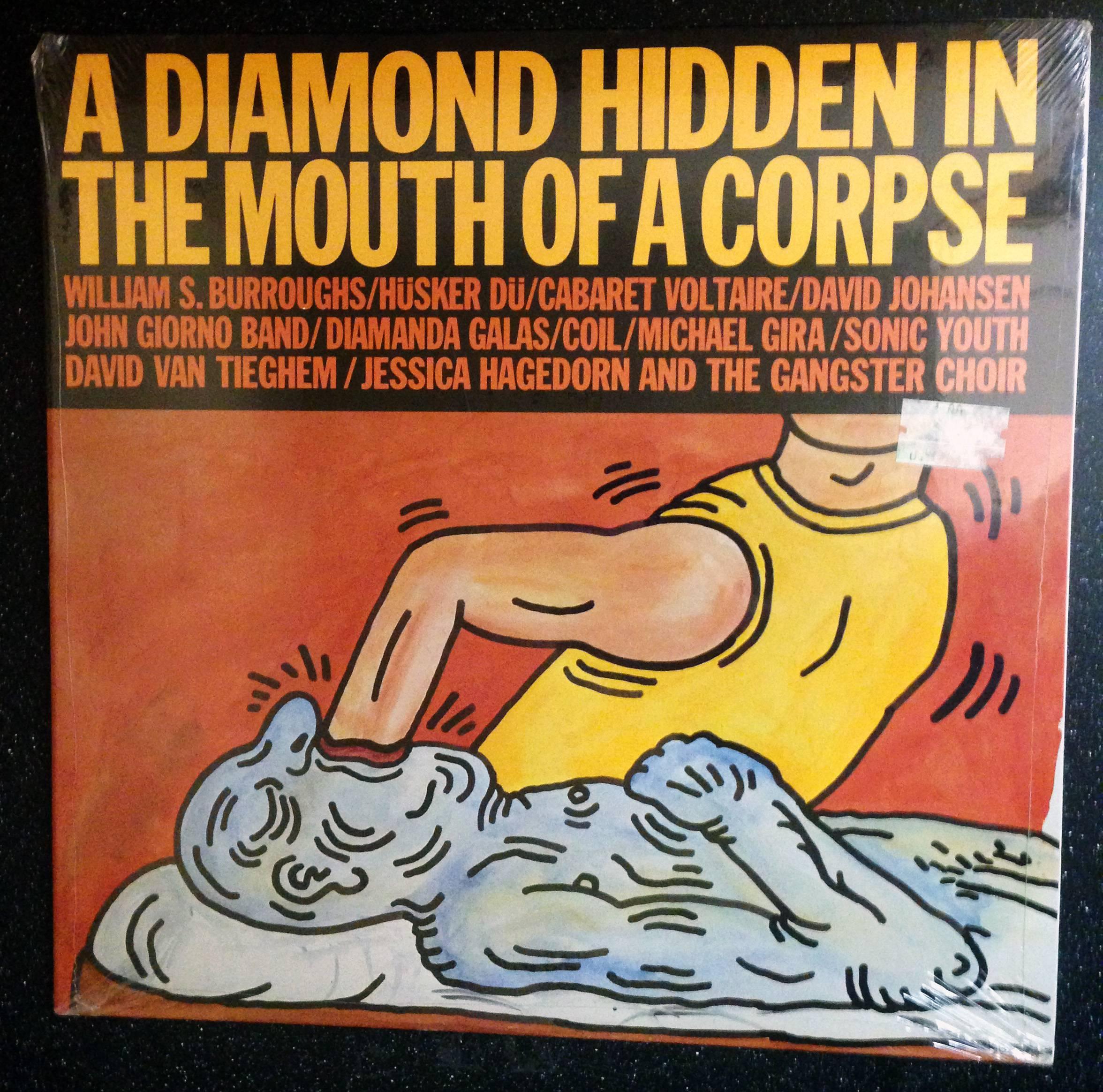 “A Diamond Hidden in the Mouth of a Corpse,” A Rare Highly Sought After 1985 Vinyl Art Cover featuring Original Artwork by Keith Haring; new/sealed in its original packaging.

In addition to the front and back cover art by Haring, this work