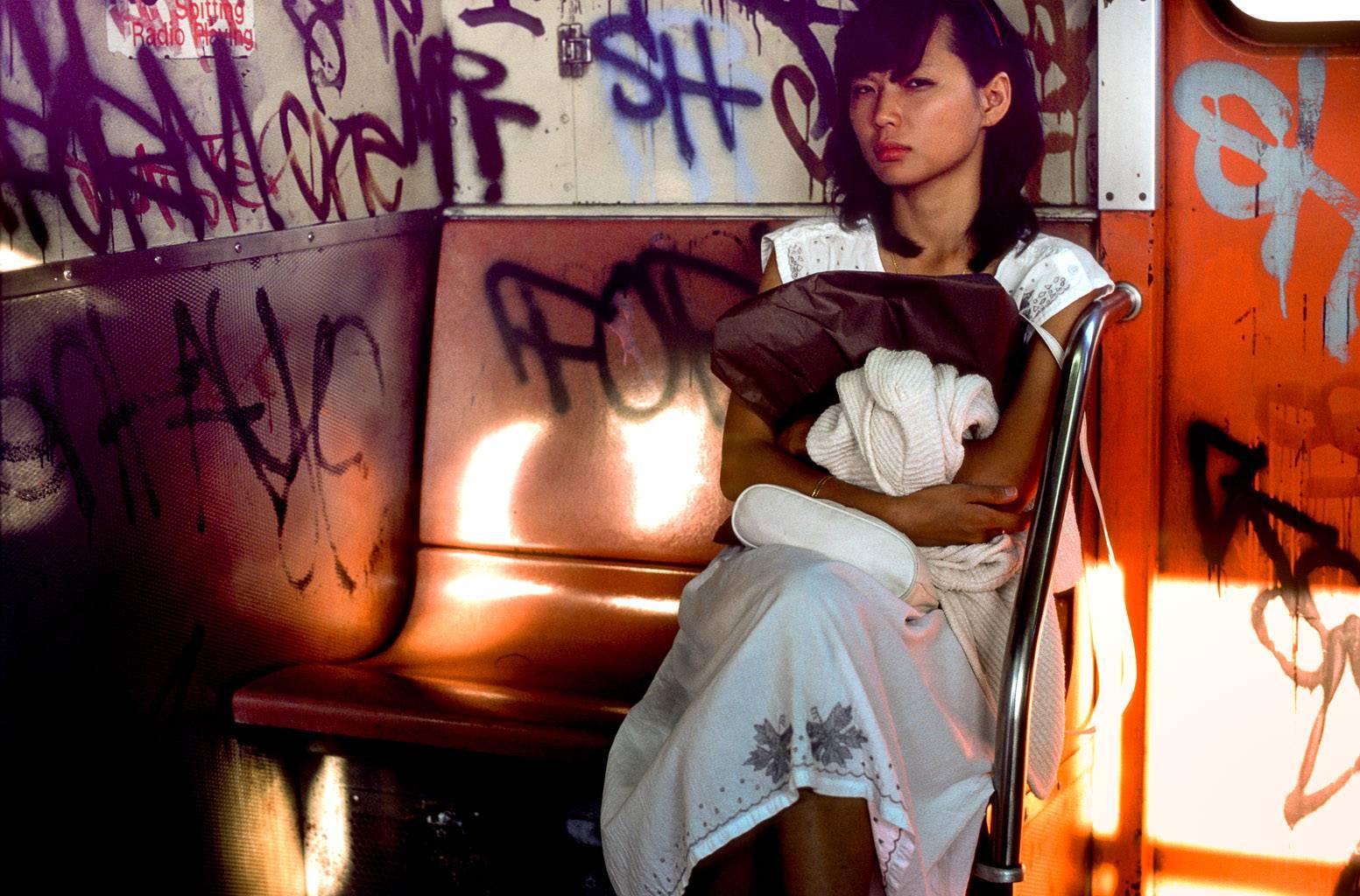 Robert Herman Color Photograph - Woman on a Train New York City 1985 (1980s NY graffiti, street art photograph) 