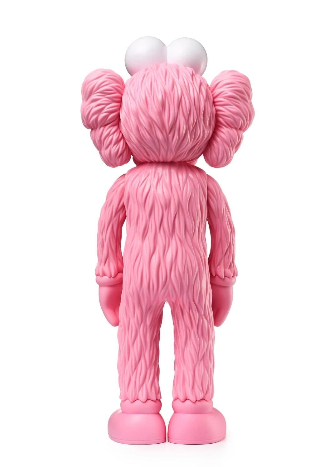 pink kaws figure
