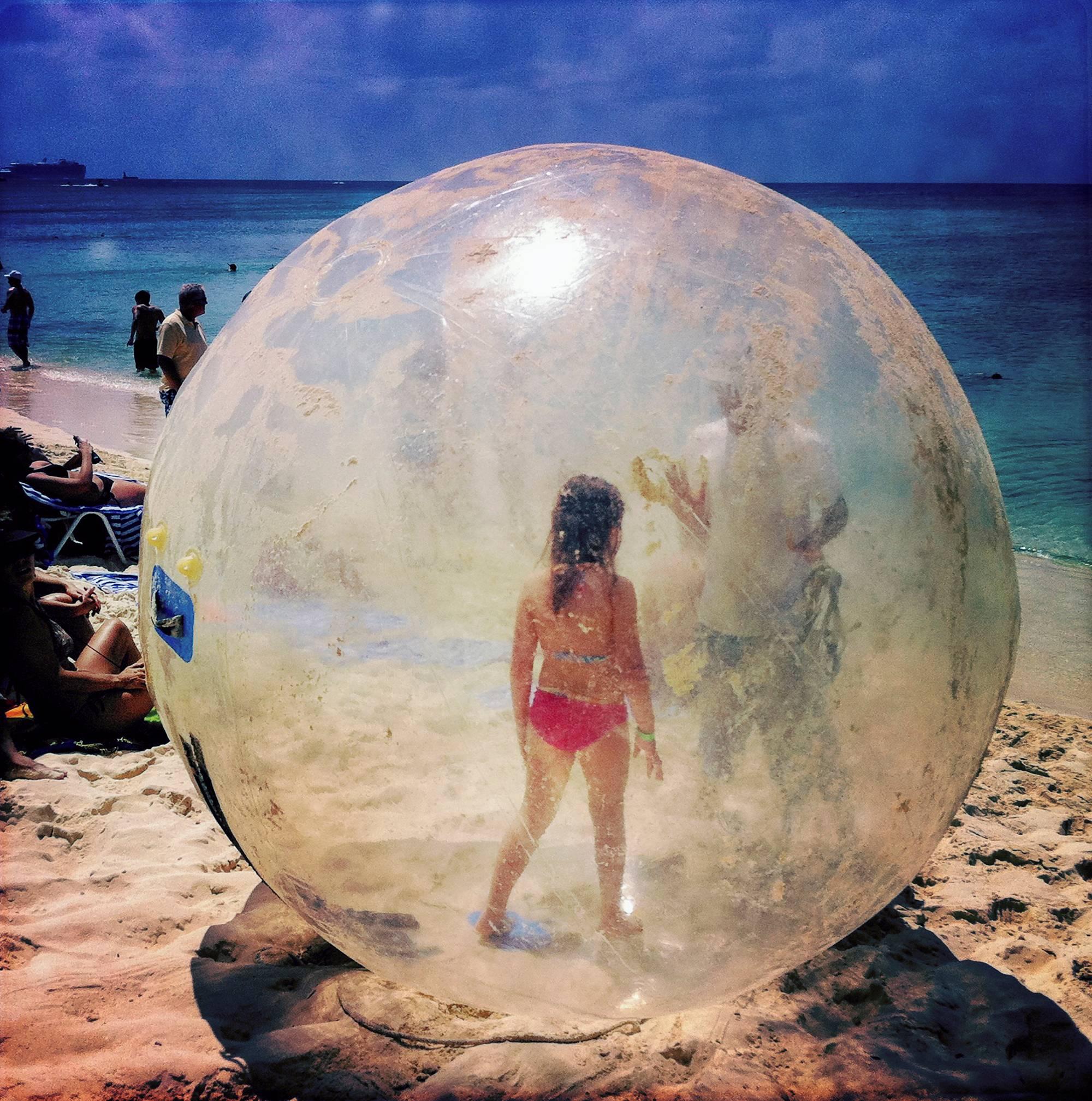 Robert Herman Landscape Photograph - Bubble Girl, The Cayman Islands (Beach photography)