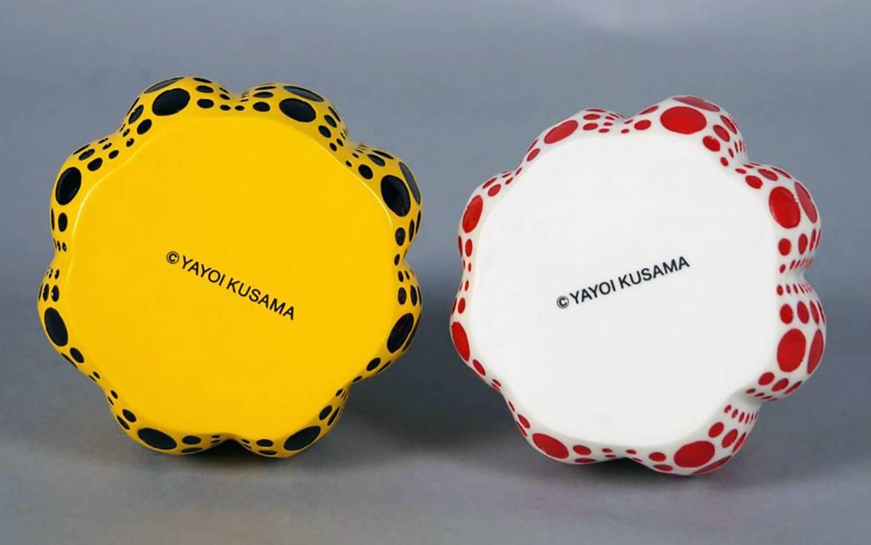 Yayoi Kusama Set of Two Pumpkins: Yellow and Black / Red and White
An iconic, vibrantly colored pop art set - these small Kusama pumpkin sculptures feature the universal polka dot patterns and bold colors for which the artist is perhaps best known.