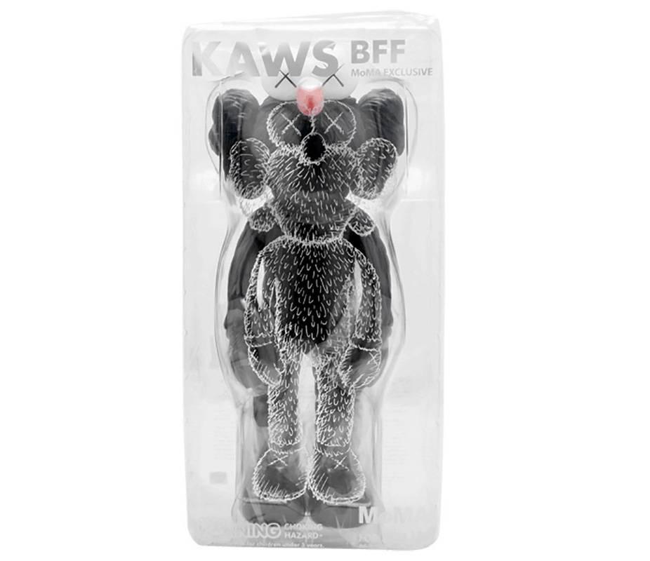 KAWS Black BFF new, unopened in its original packaging. 
A well-received work and variation of Kaws' large scale BFF sculpture is in Los Angeles's Playa Vista neighborhood. 

Medium: Vinyl & Cast Resin 
Published by Medicom Japan. 2017. 
13 x 5.7 x