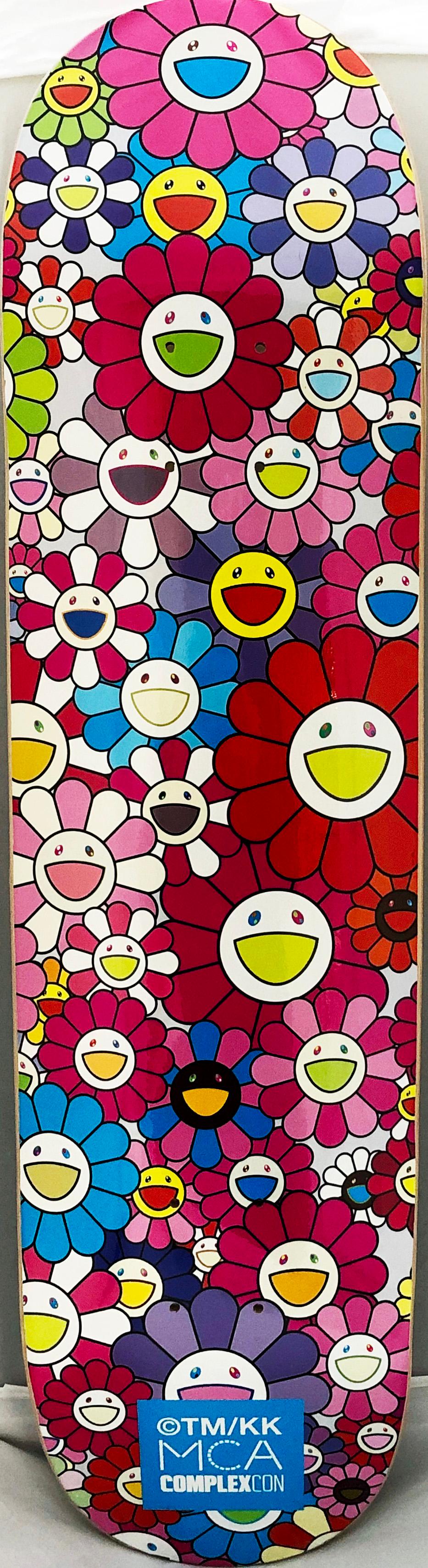 Takashi Murakami Flowers Skate Deck 
A vibrant piece of Takashi Murakami wall art produced as a limited series in conjunction with the 2017 Murakami exhibit: The Octopus Eats Its Own Leg, MCA Chicago. This deck is new in its original packaging. A