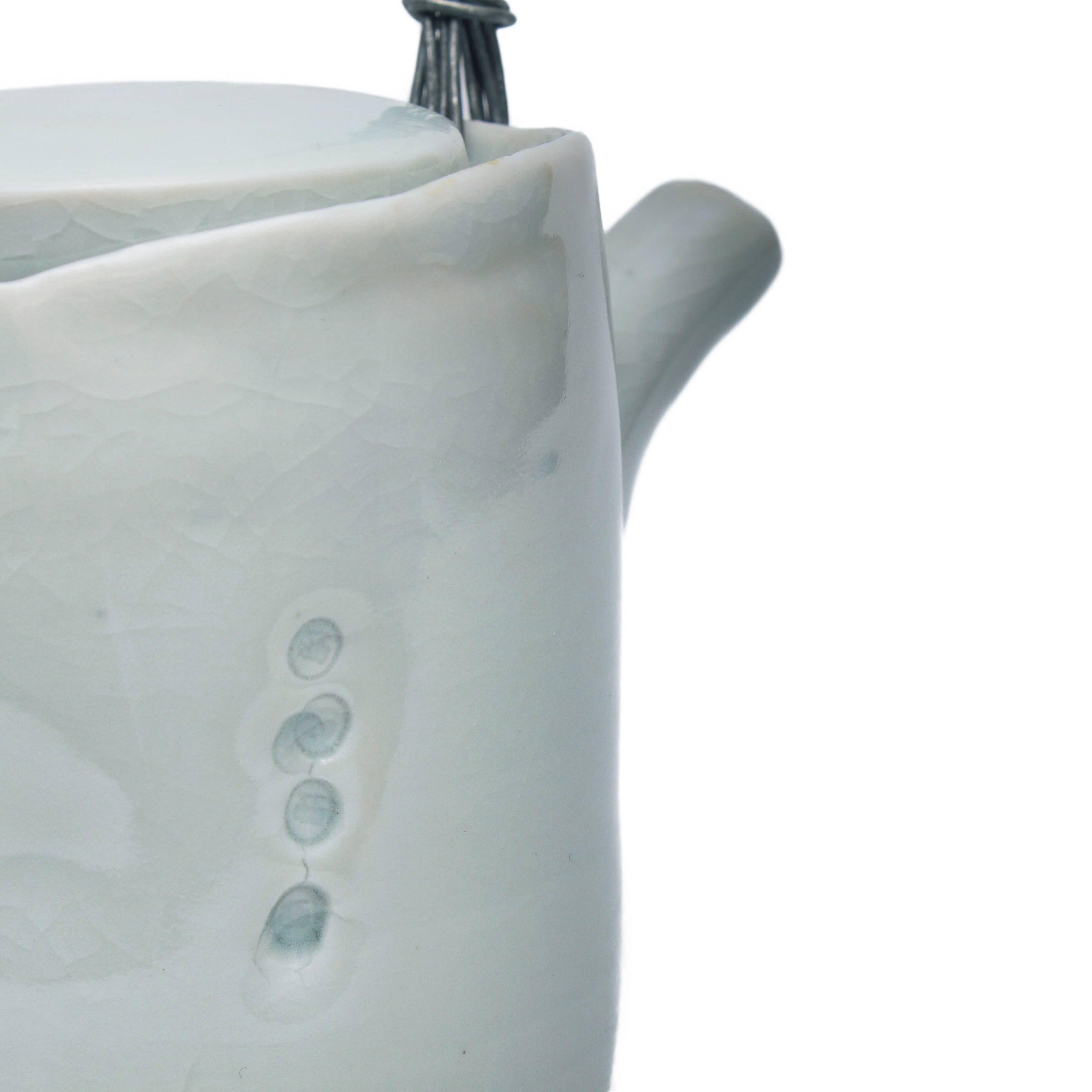porcelain, celadon glaze
A very rare teapot.
De Waal is represented by the Gagosian Gallery.