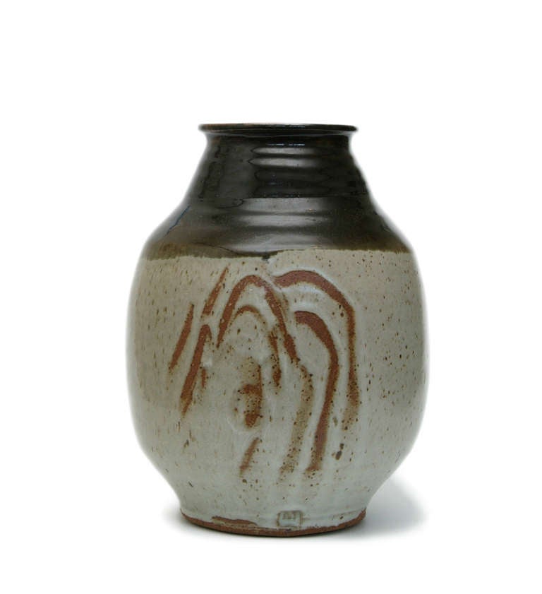Stoneware vase
Tenmoku  and white glaze with finger swipes