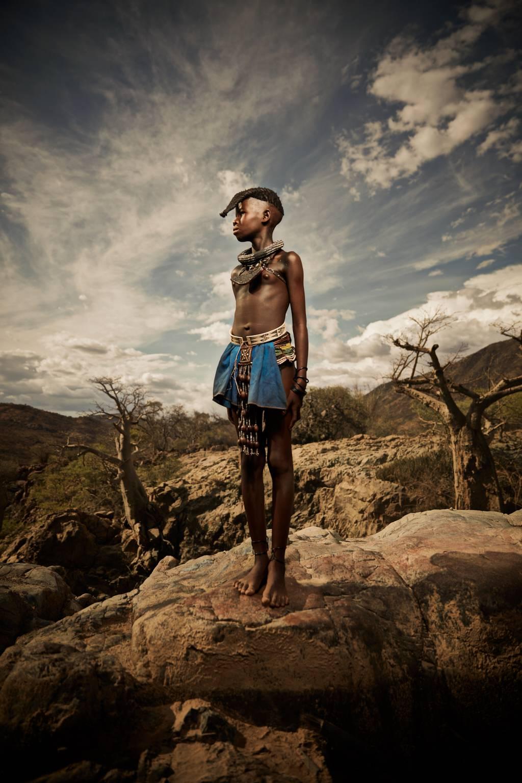 Chris Gordaneer Color Photograph - Himba Girl, Epupa Falls.