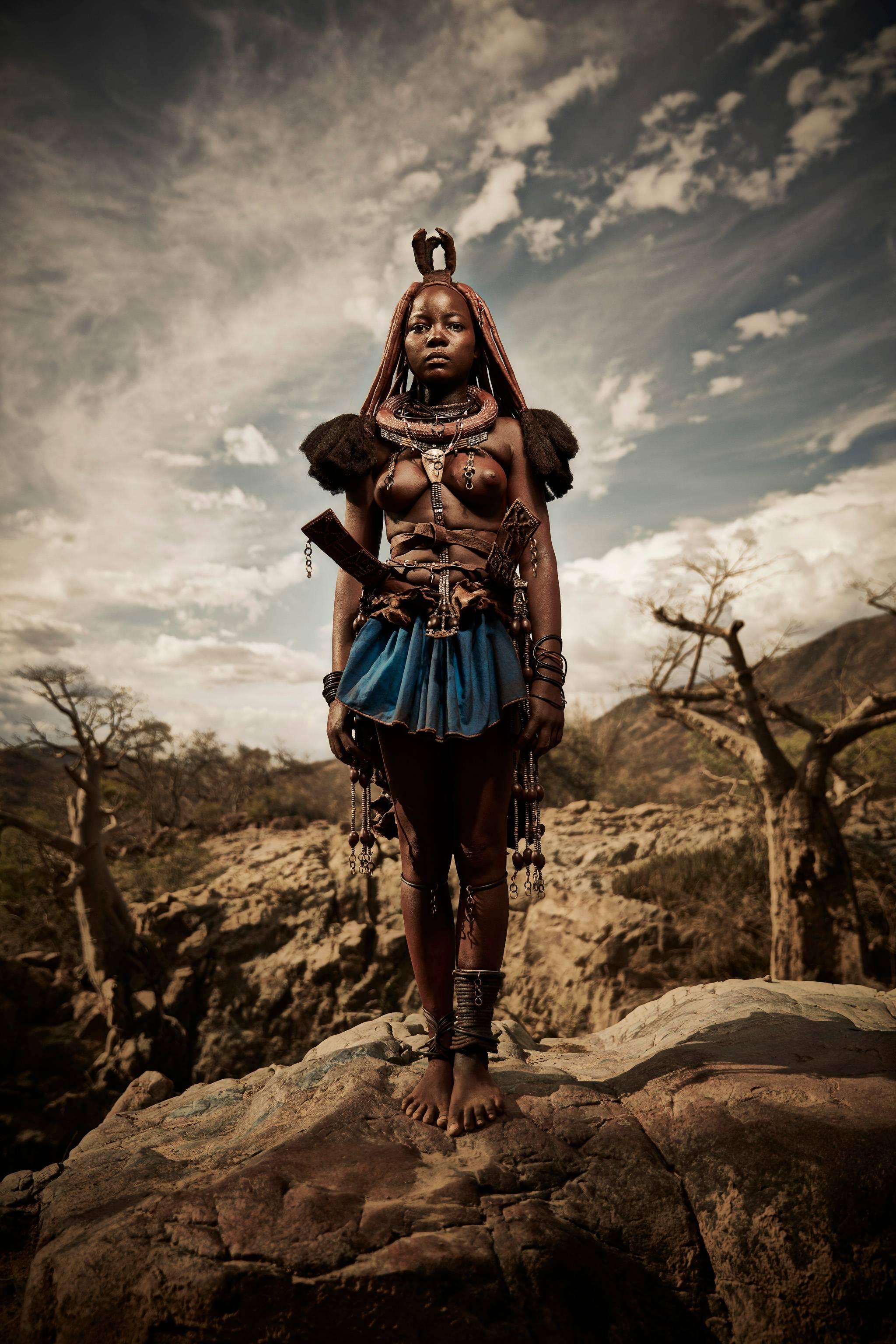 Chris Gordaneer Color Photograph - Himba Woman Epupa Falls 3