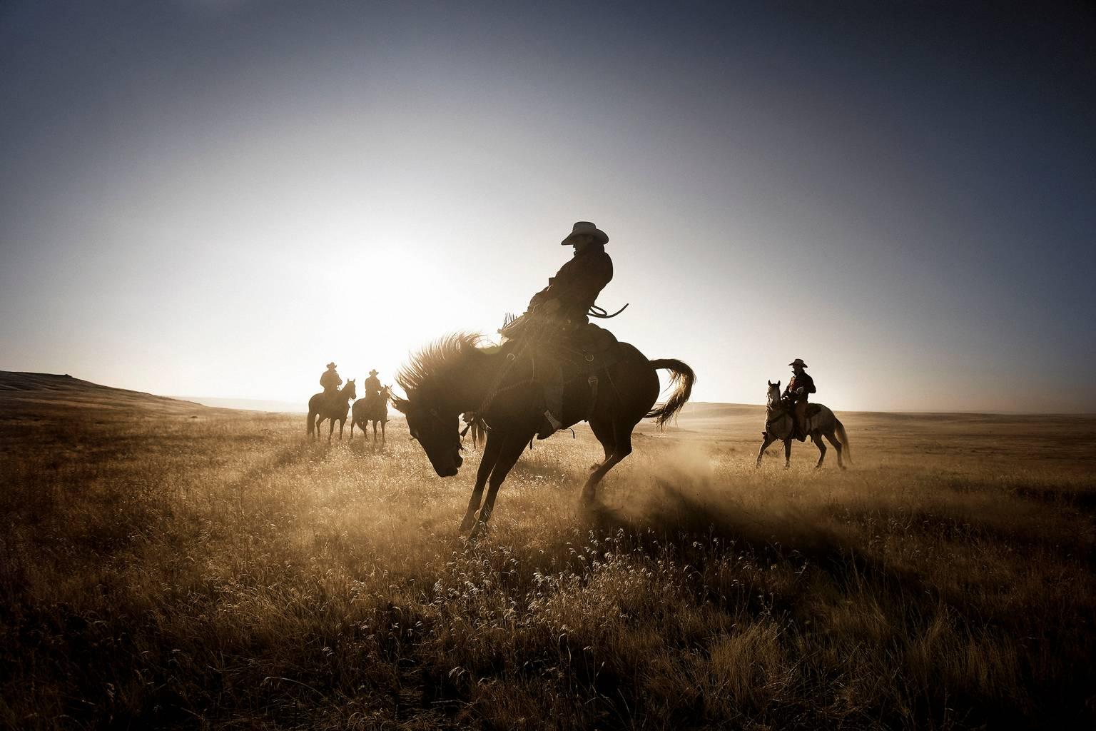 Chris Gordaneer Color Photograph - Cowboys