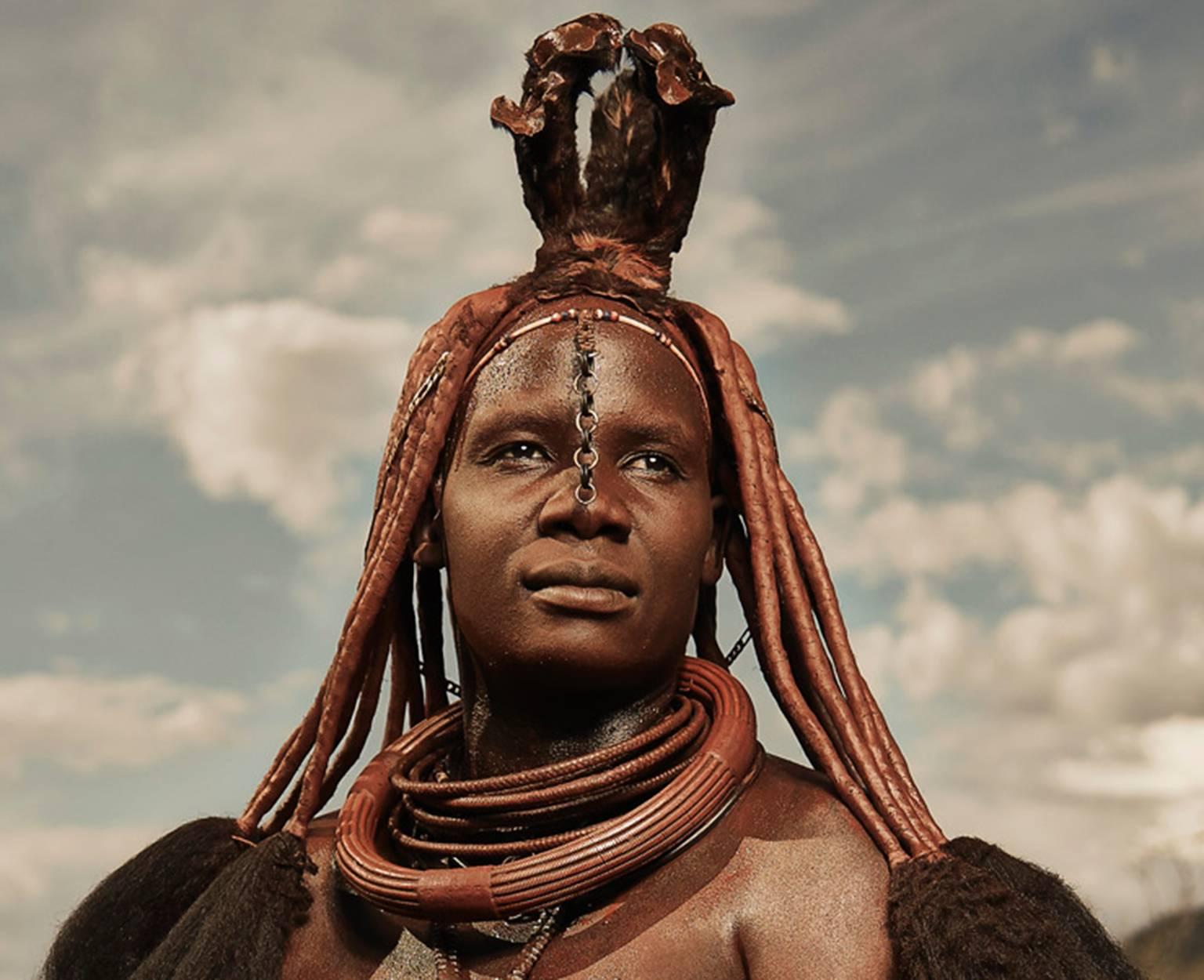 Himba Women Epupa Falls 5 - Photograph by Chris Gordaneer